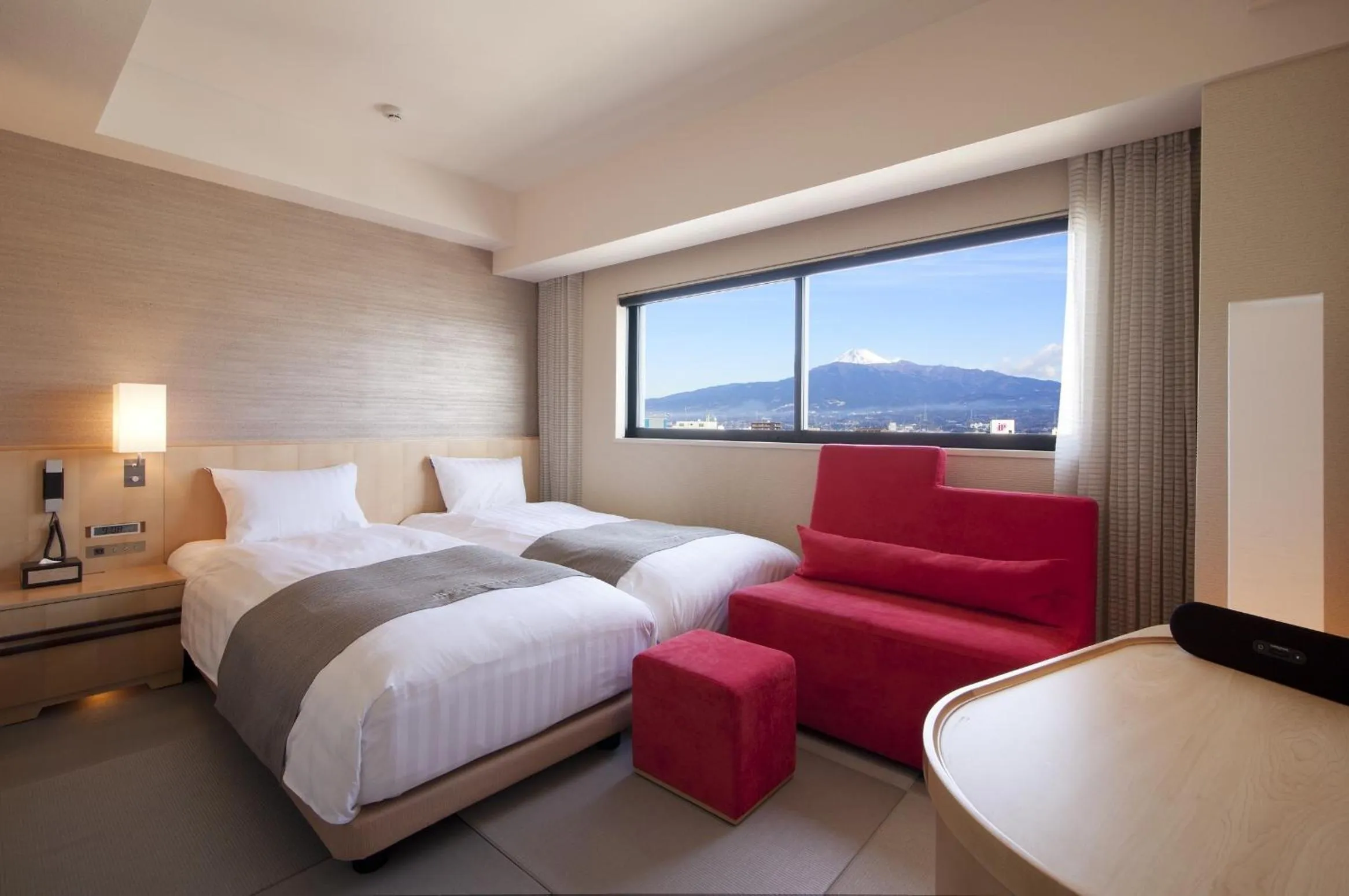 Photo of the whole room, Bed in Cocochee Hotel Numazu