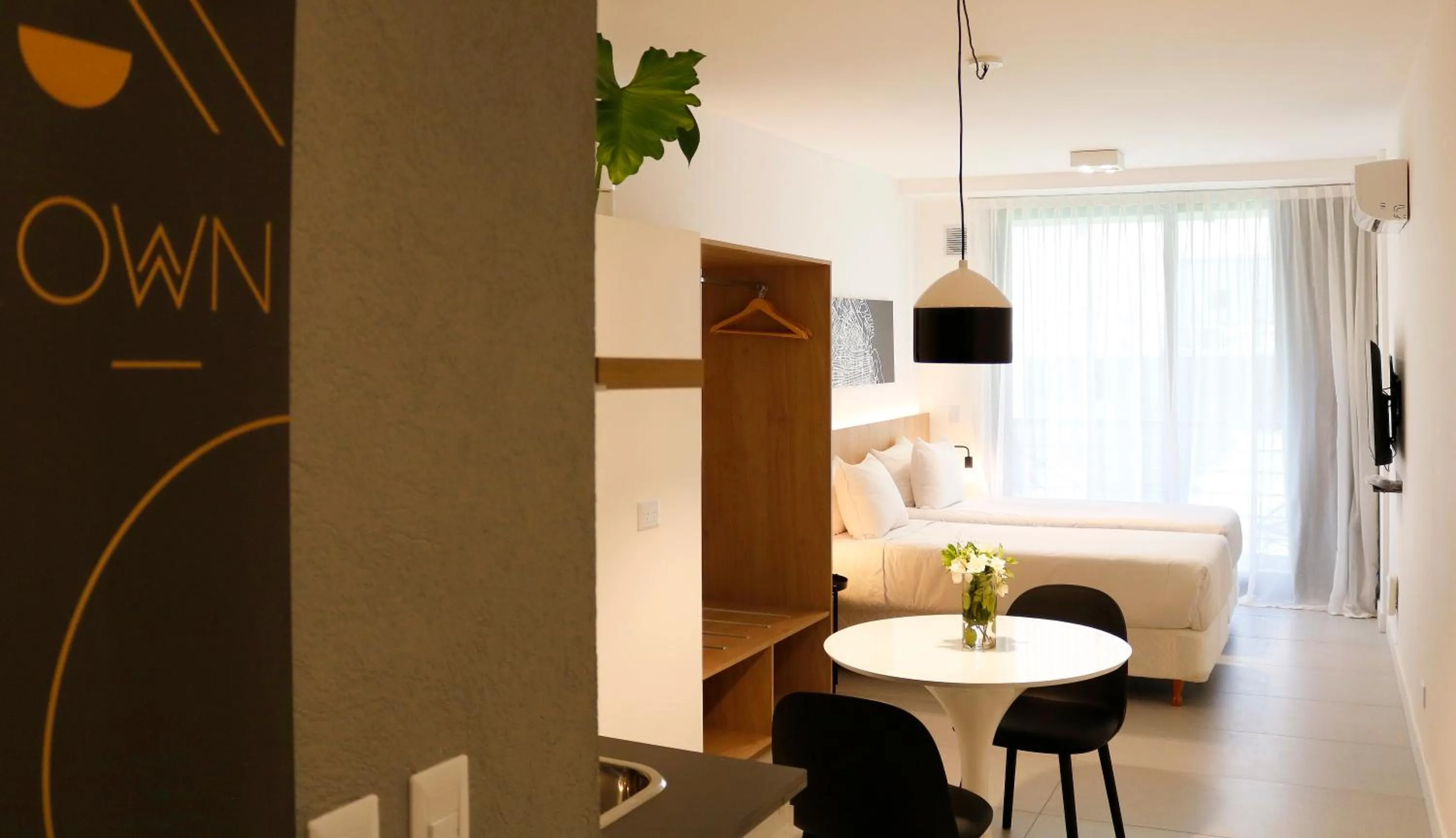 Dining area, Bed in OWN Palermo