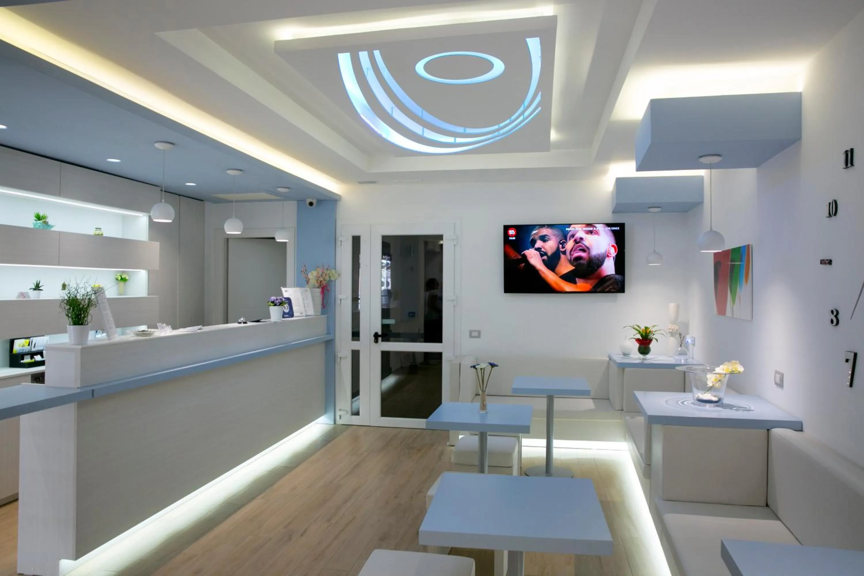 Communal lounge/ TV room in Hotel Perla Gaia