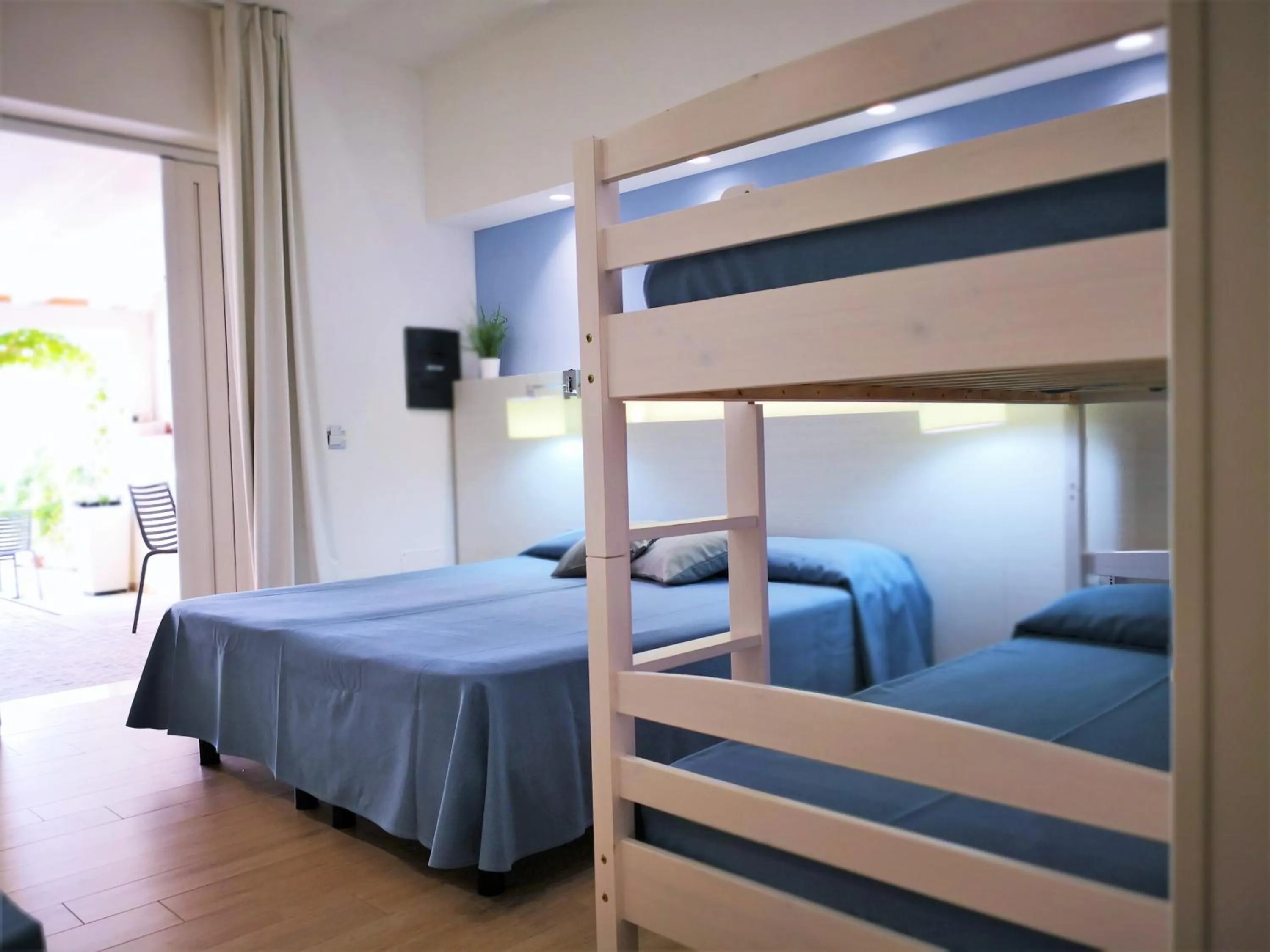 Bed in Hotel Perla Gaia