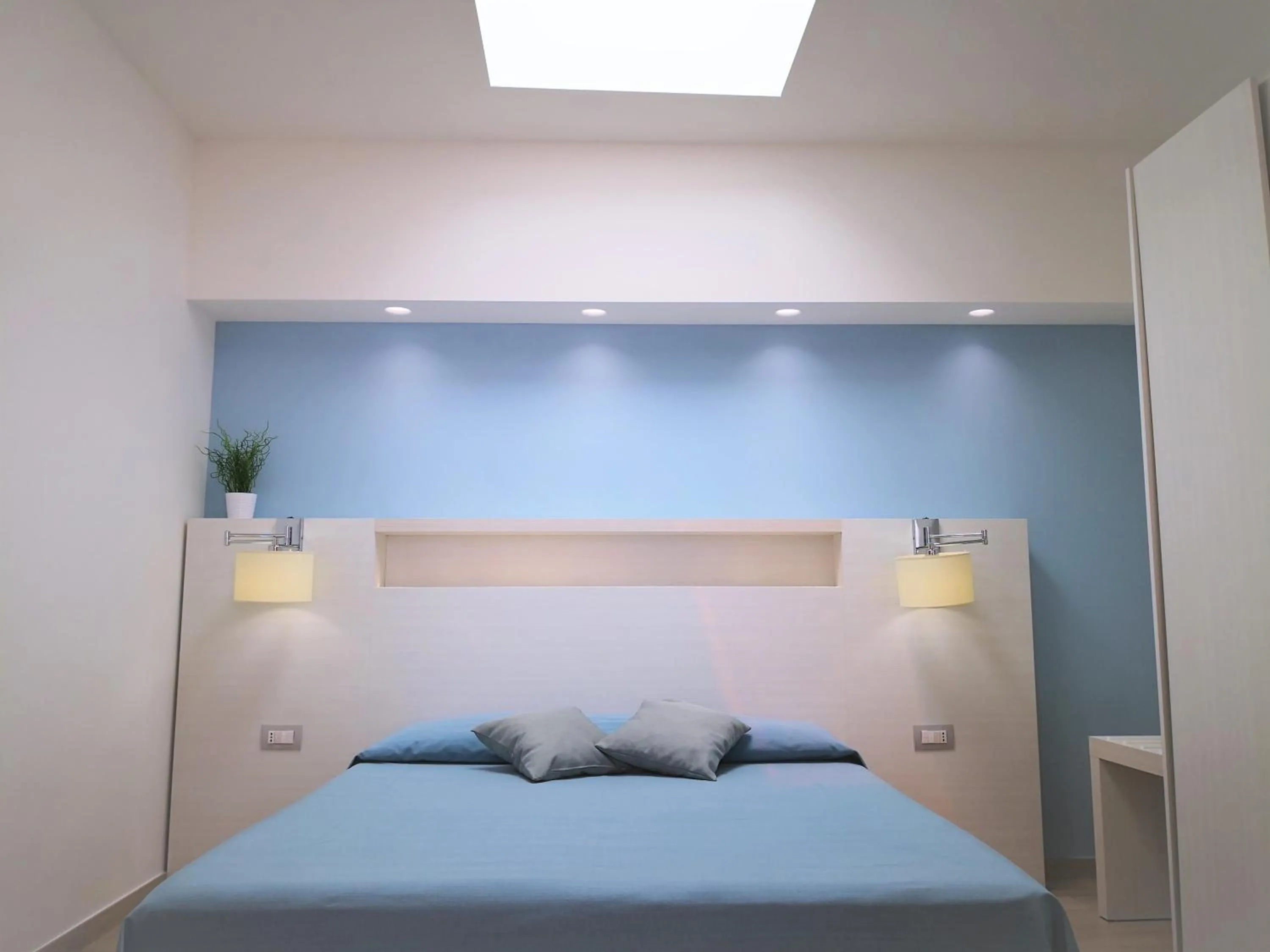 Bed in Hotel Perla Gaia