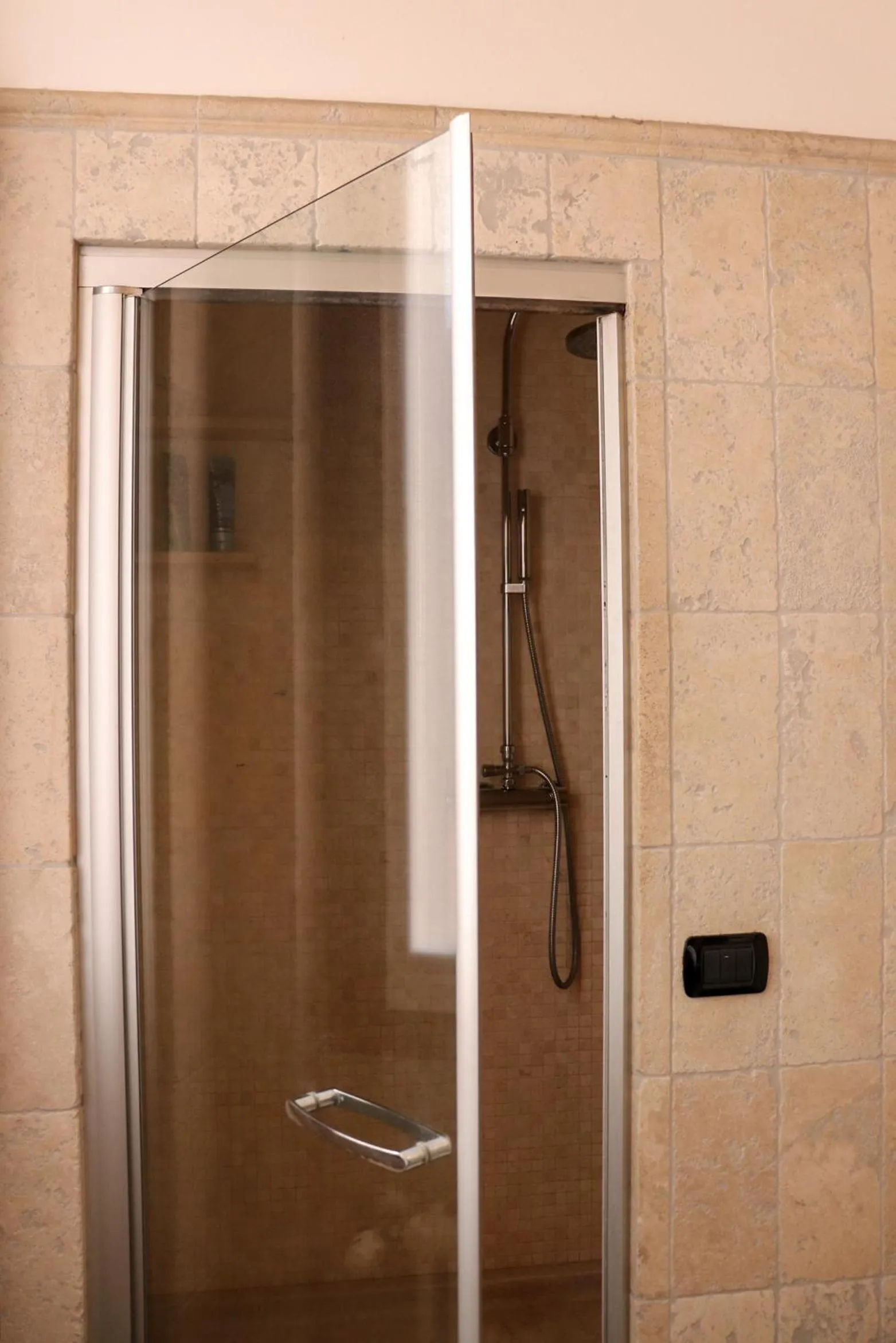 Shower in La Corte di Brusuglio Apartments