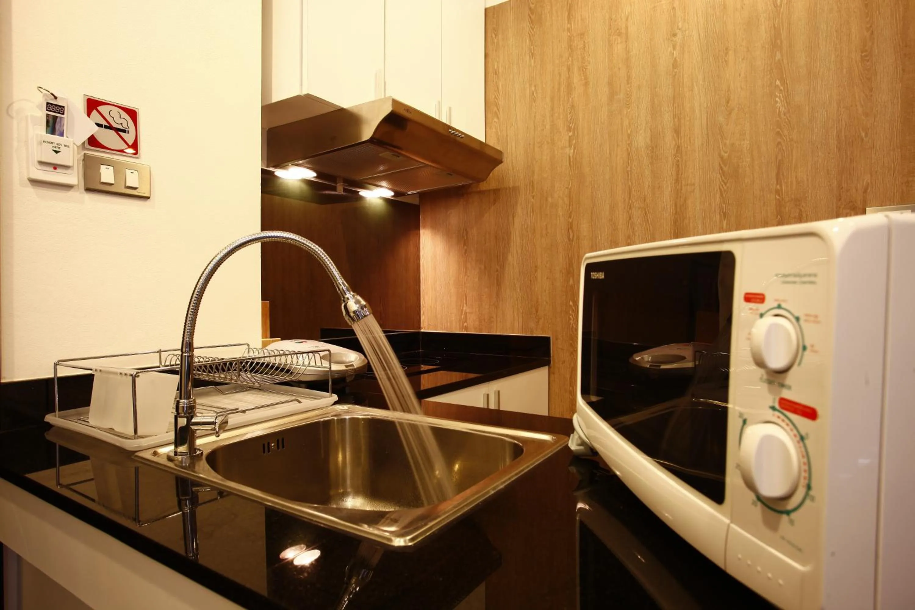 Kitchen or kitchenette in Buasri By Ohm