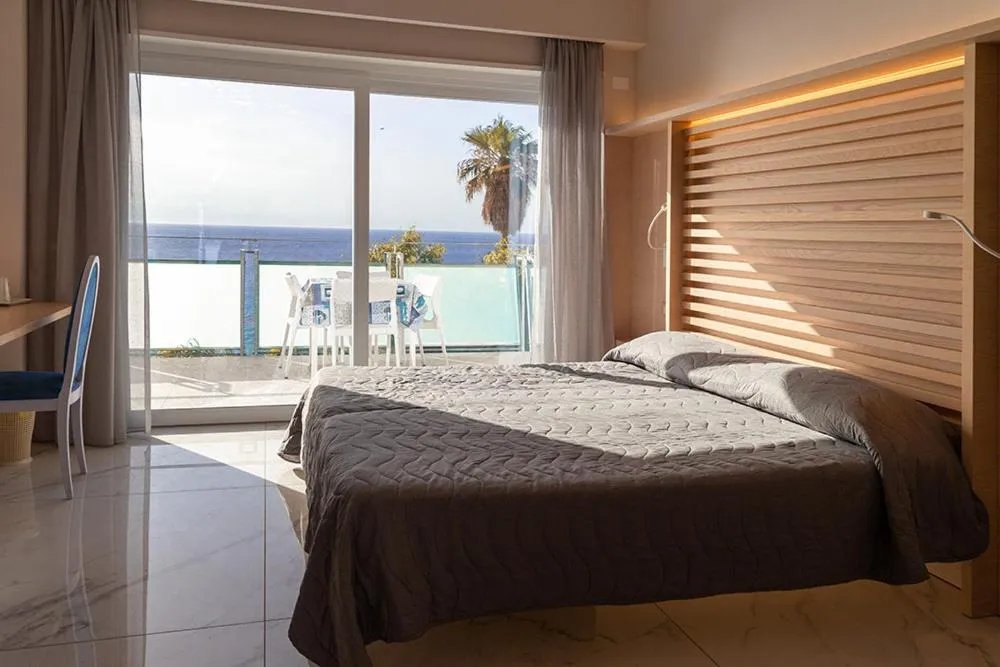 Bed in Hotel Villaggio Stromboli