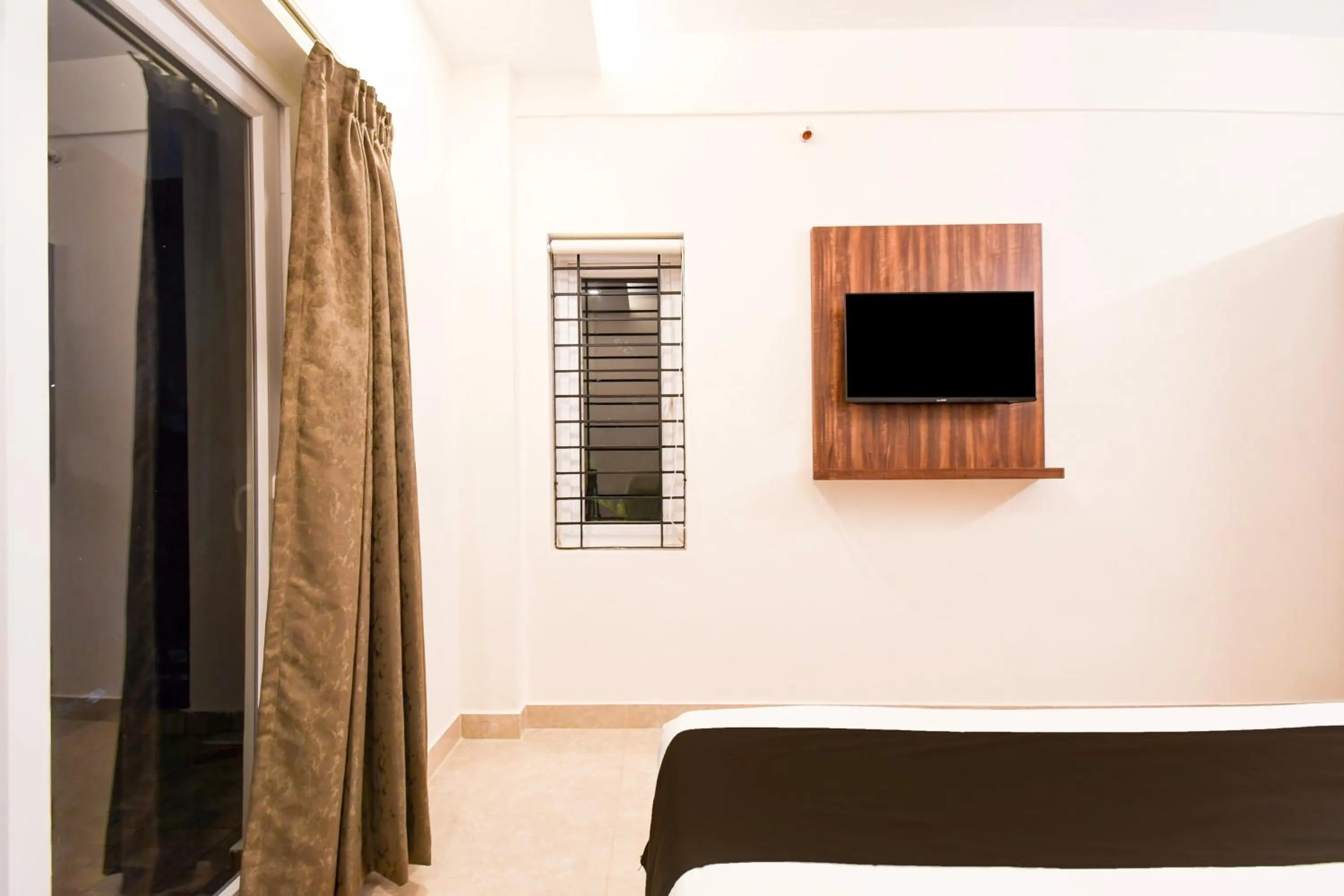 Bedroom in Super Hotel O GAJAPATI PREMIUM