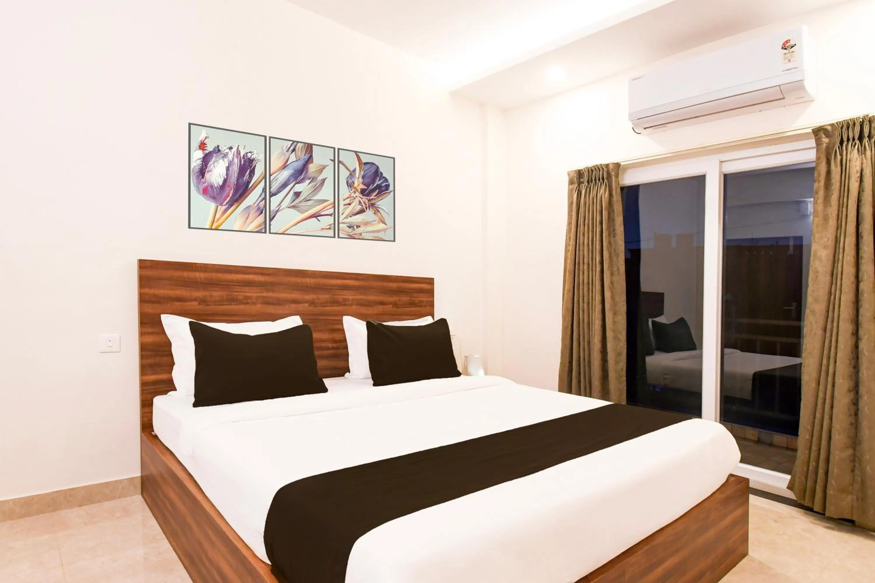 Bedroom in Super Hotel O GAJAPATI PREMIUM