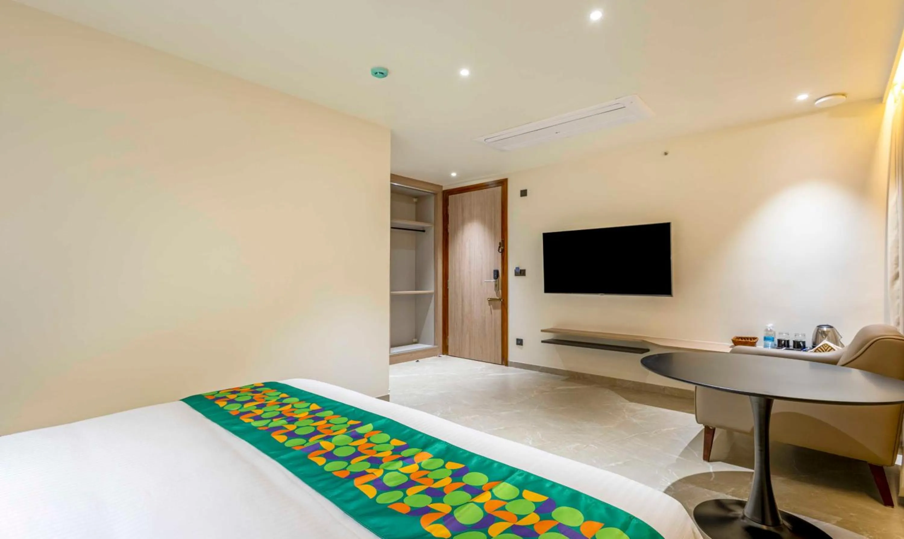 Bedroom, Bed in Treebo Premium Lalitha, RK Beach