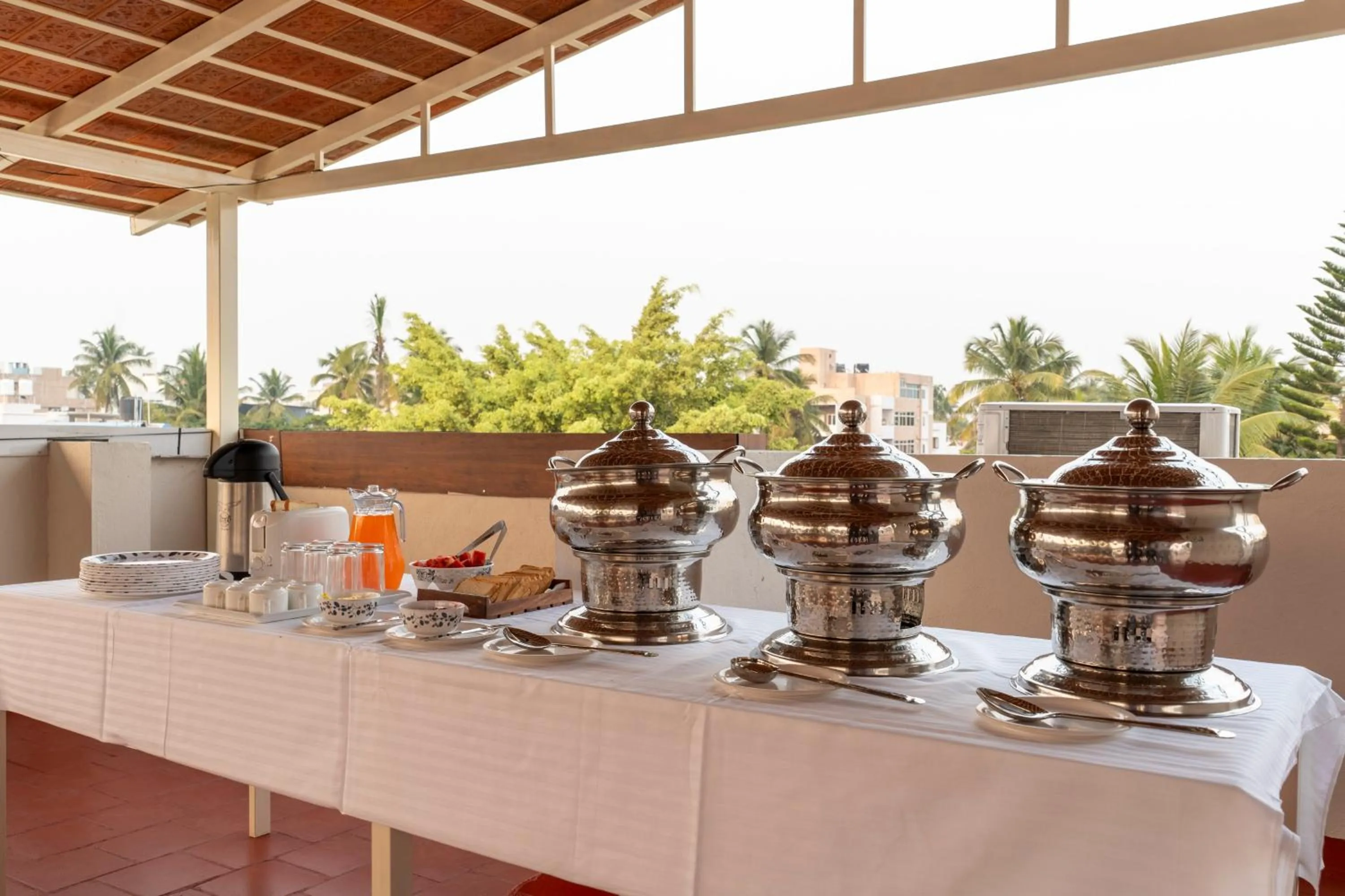 Dining area in Treebo Sanmaya Retreat, 15 Mins From Mysore Palace