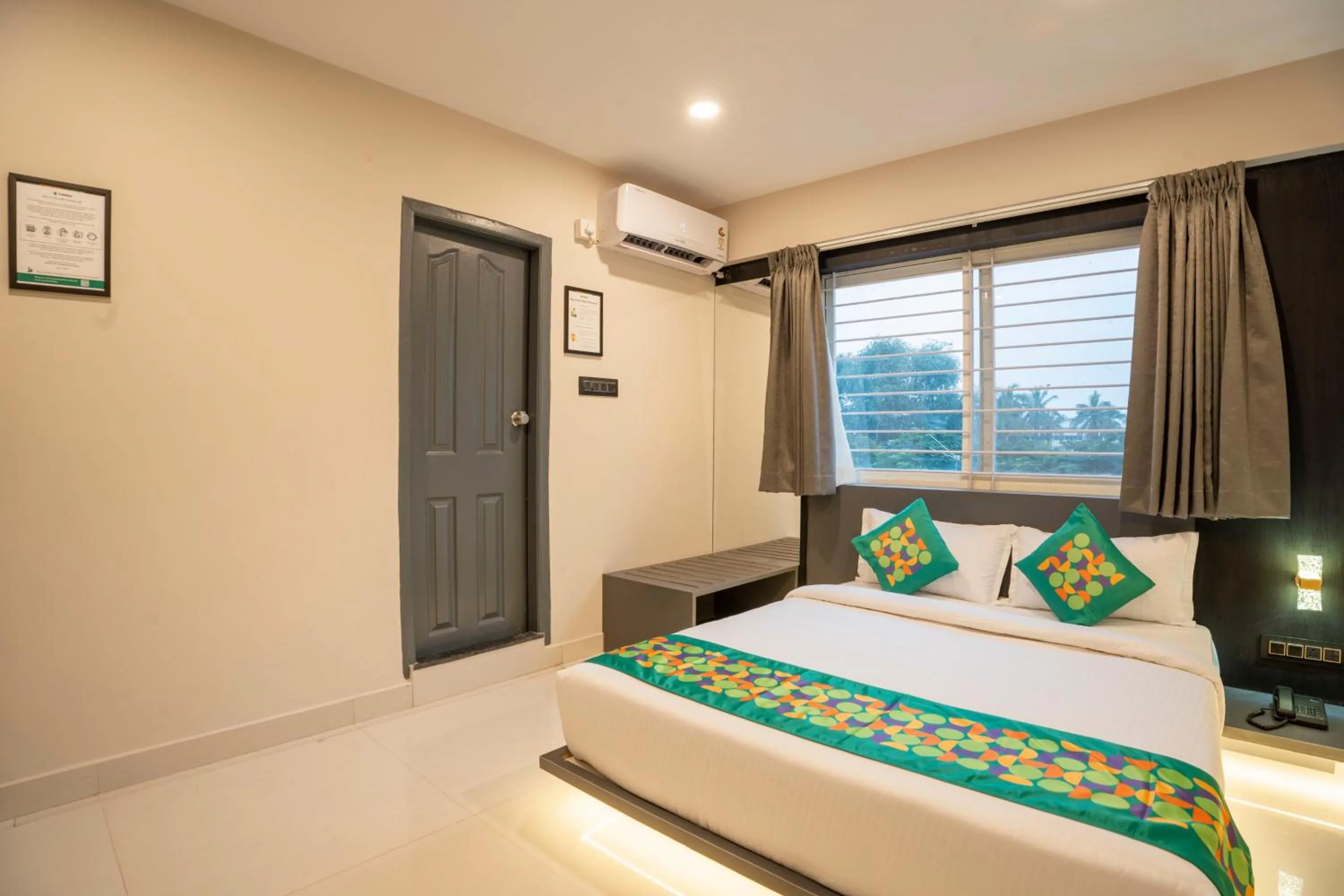 Bedroom, Bed in Treebo Sanmaya Retreat, 15 Mins From Mysore Palace