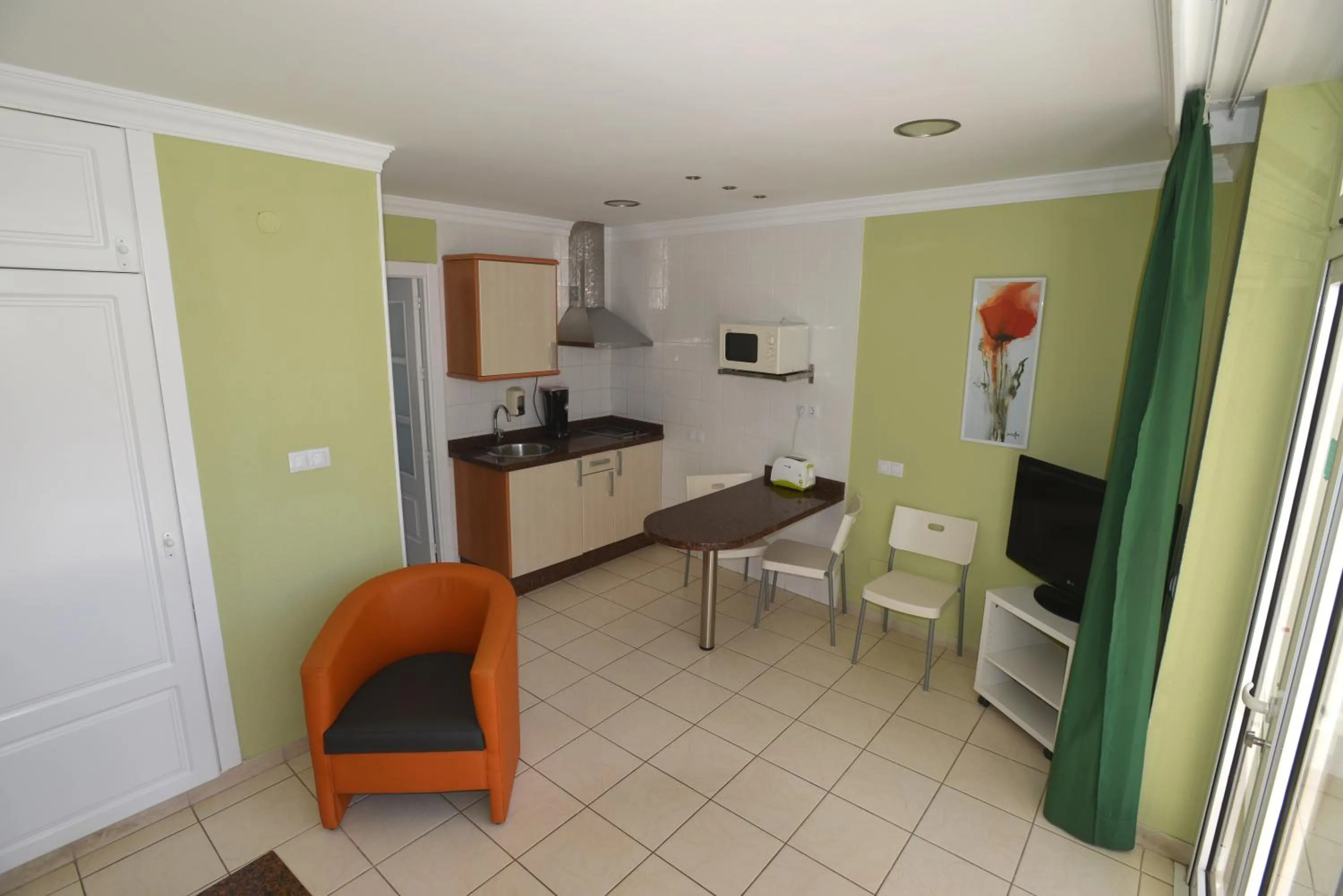 Kitchen or kitchenette in Apartamentos Arco Iris
