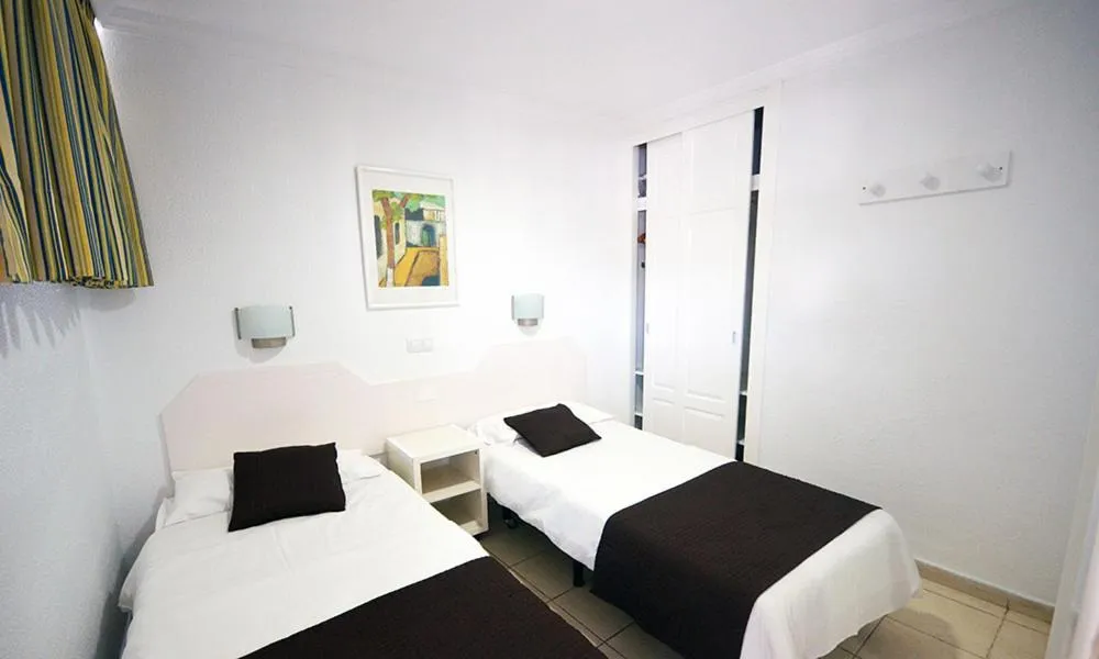 Photo of the whole room, Bed in Apartamentos Arco Iris