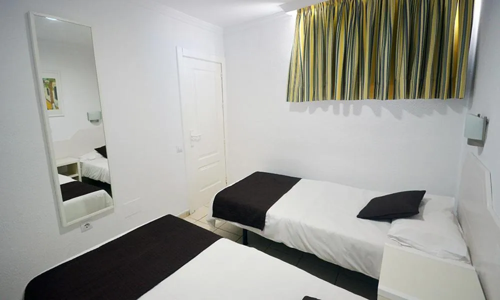 Bed in Apartamentos Arco Iris