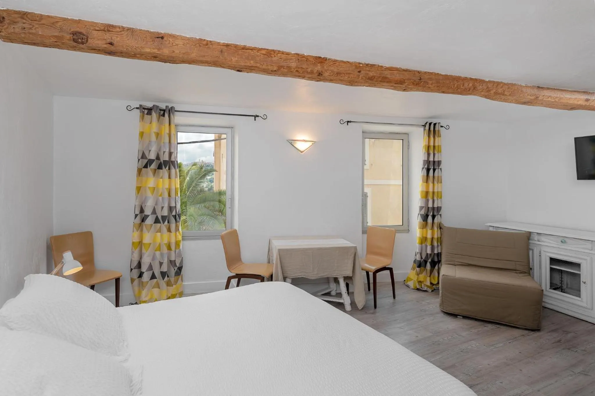 Bed in Maison Carles BnB