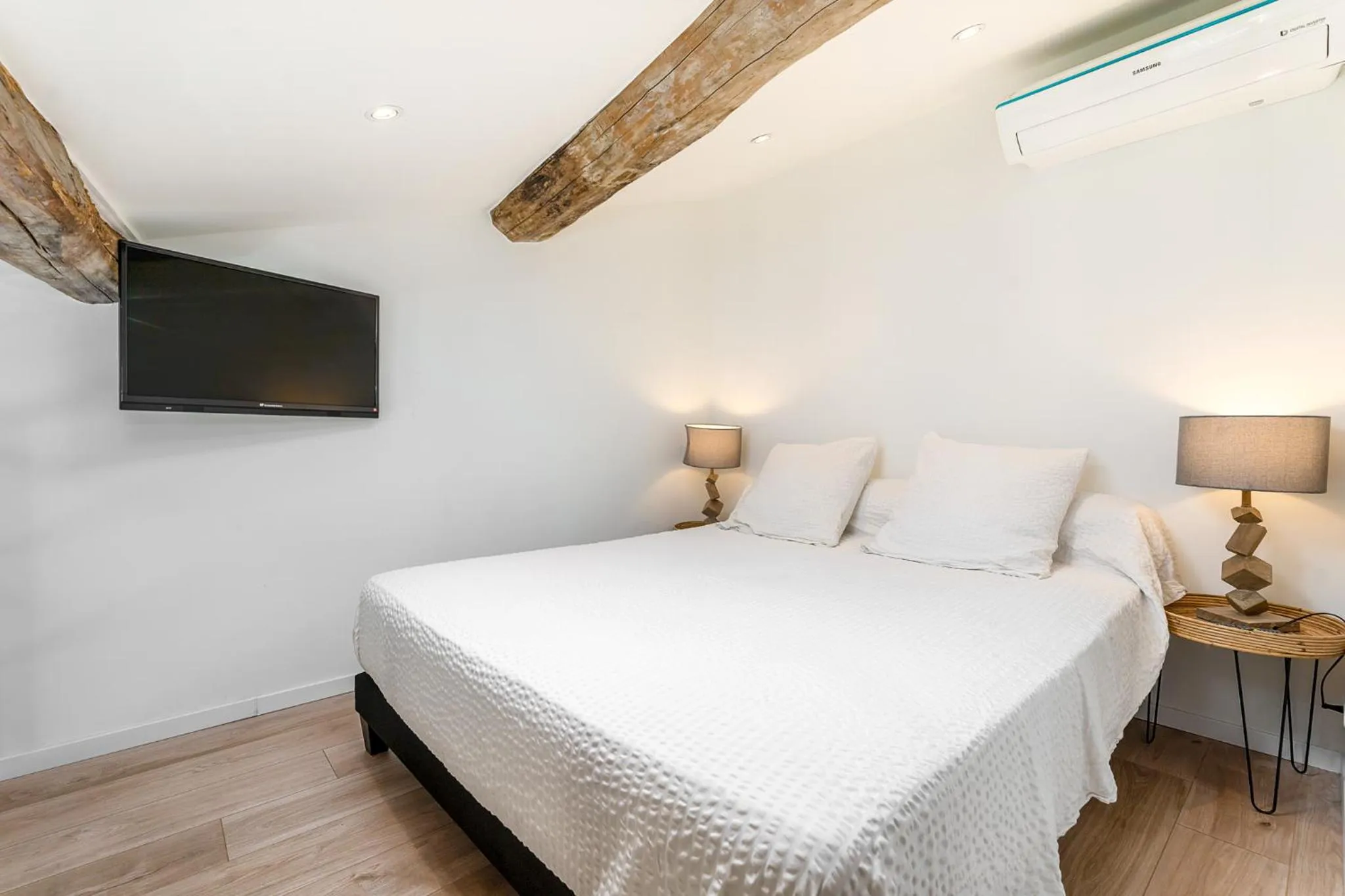 Bed in Maison Carles BnB