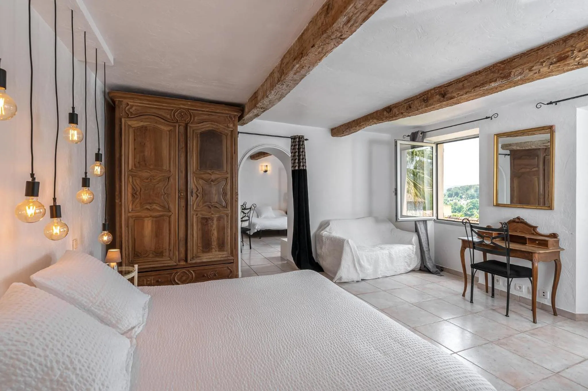 Bed in Maison Carles BnB