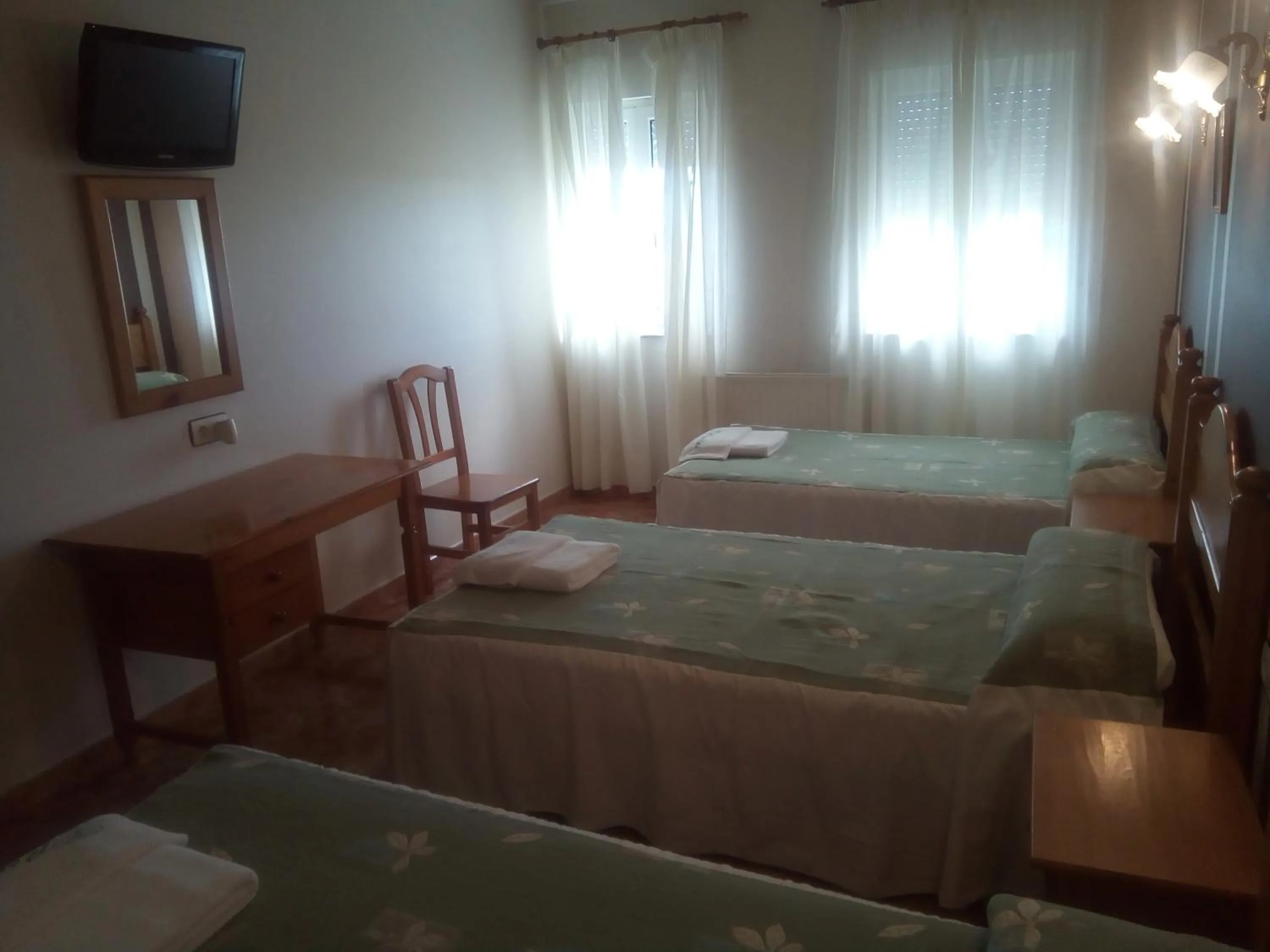 Bed in Hotel Restaurante Las Camelias