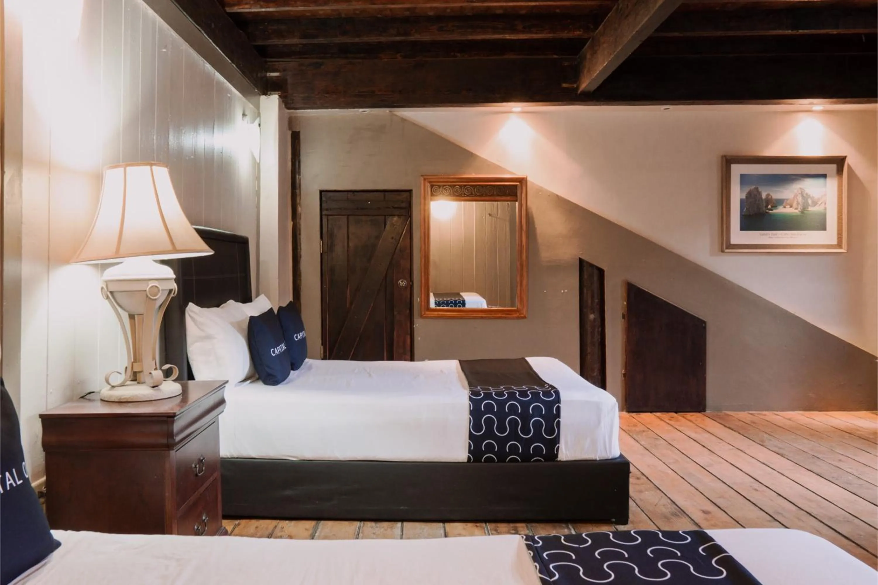 Bedroom, Bed in Capital O Hotel Villa Azura