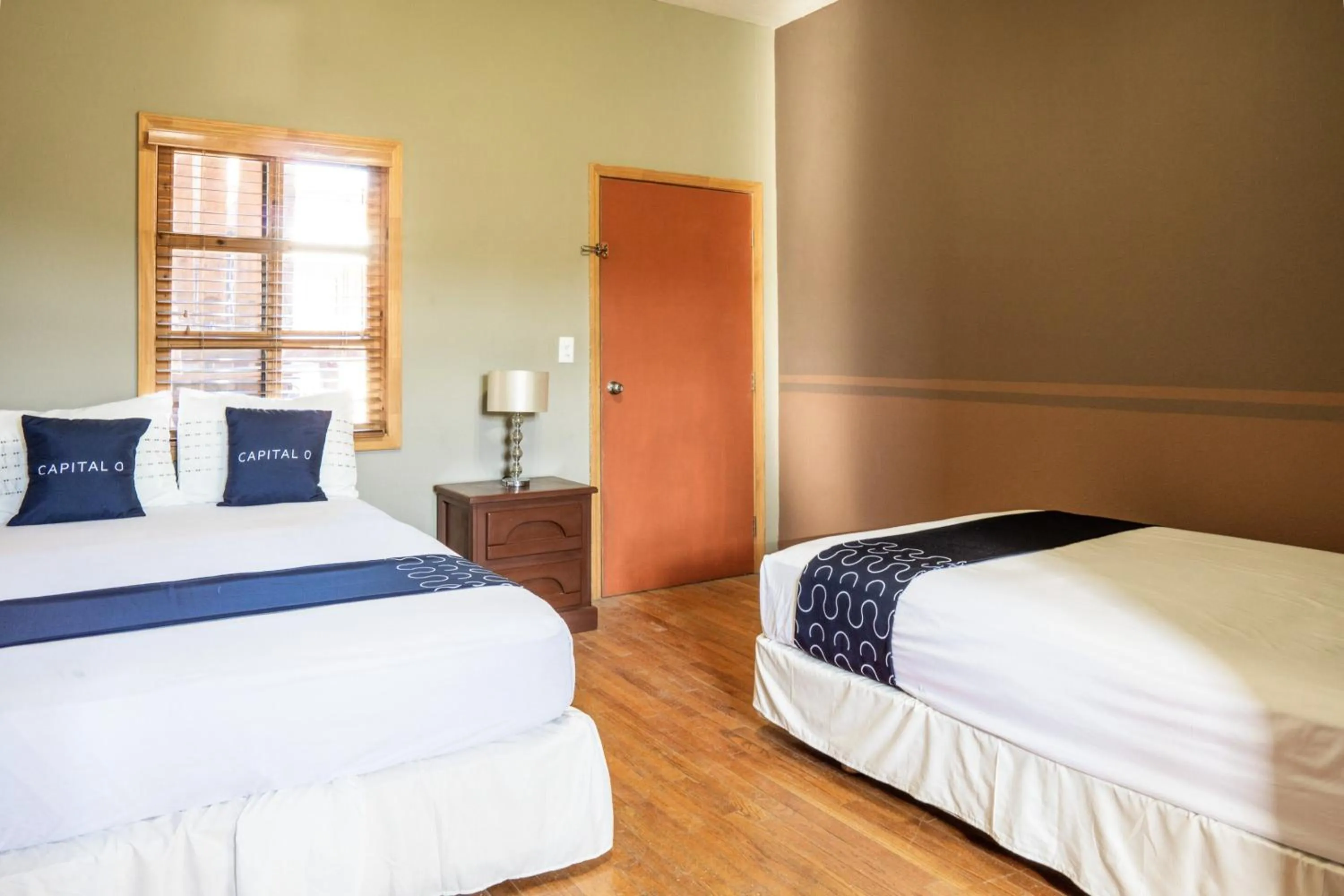 Bedroom, Bed in Capital O Hotel Villa Azura