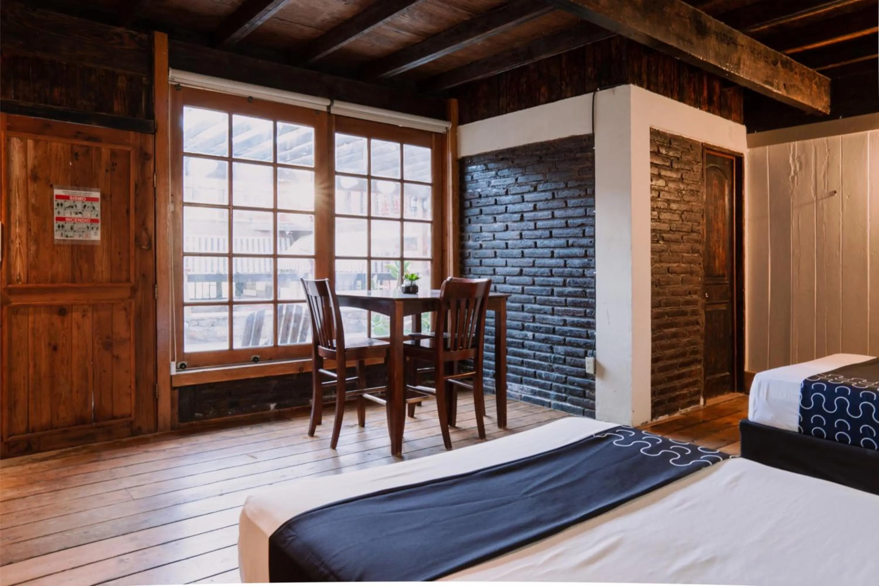 Bedroom, Bed in Capital O Hotel Villa Azura