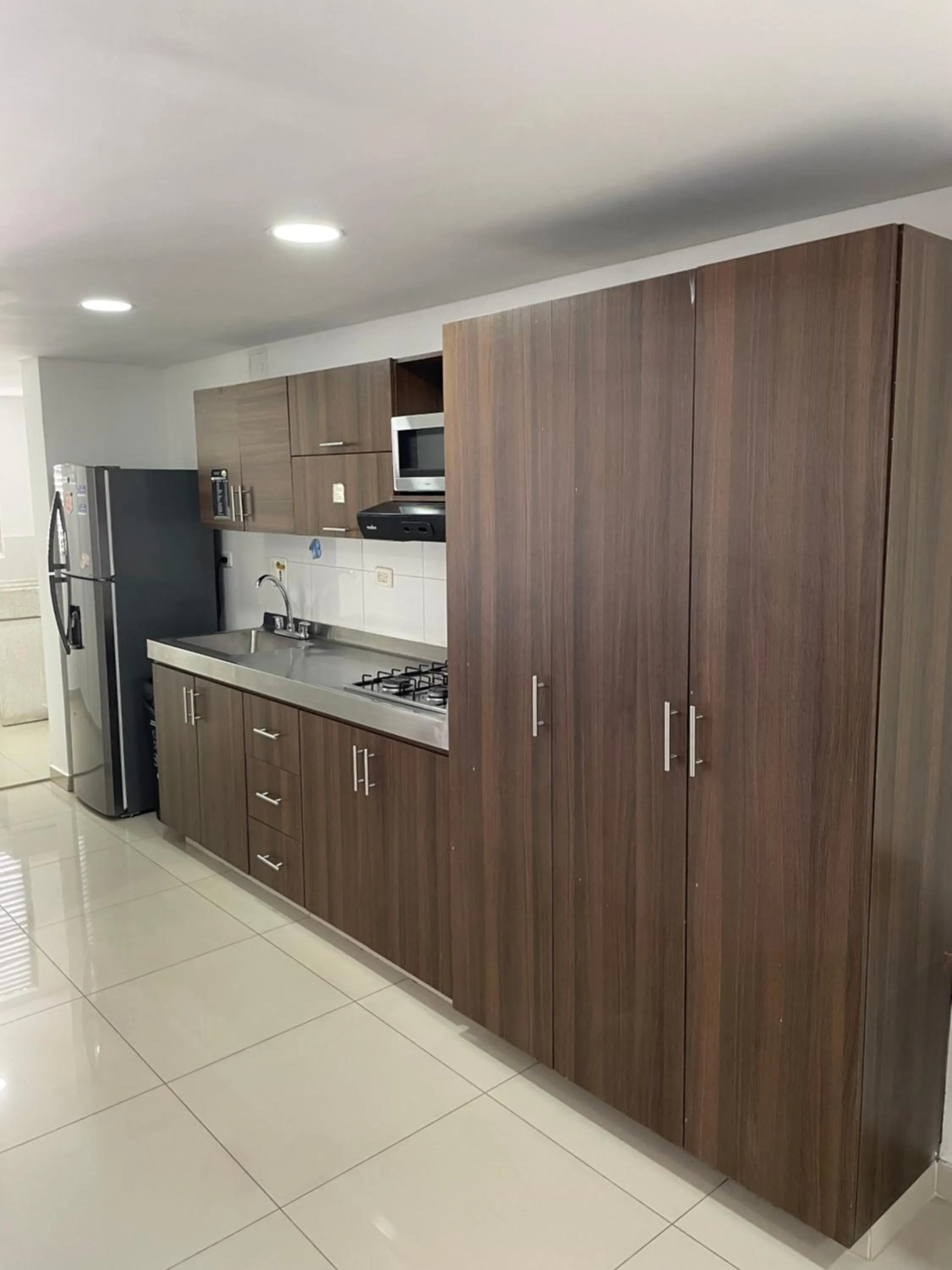 Kitchen or kitchenette in Ivanna Jumar ApartaHotel - Laureles Estadio