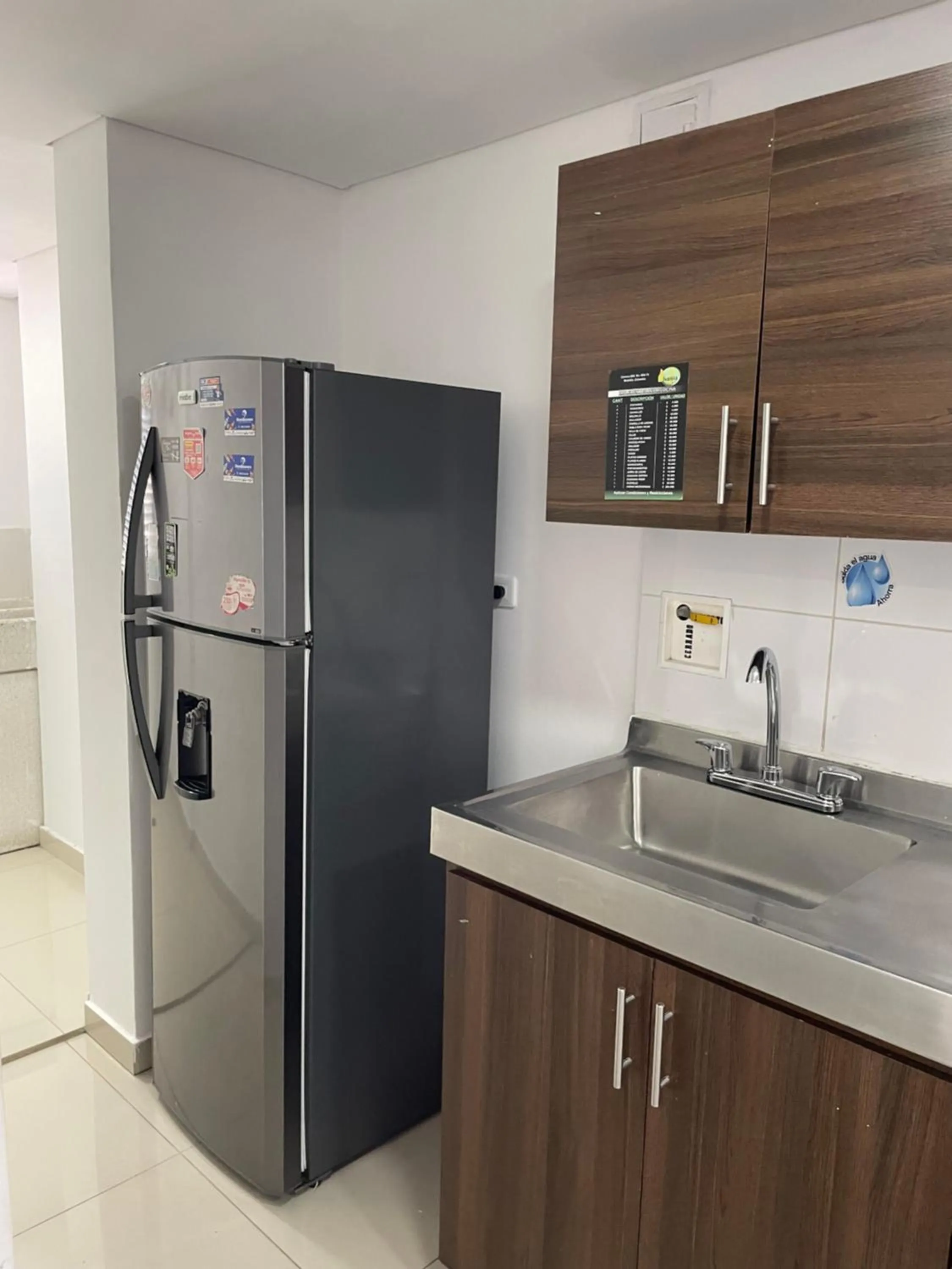Kitchen or kitchenette in Ivanna Jumar ApartaHotel - Laureles Estadio
