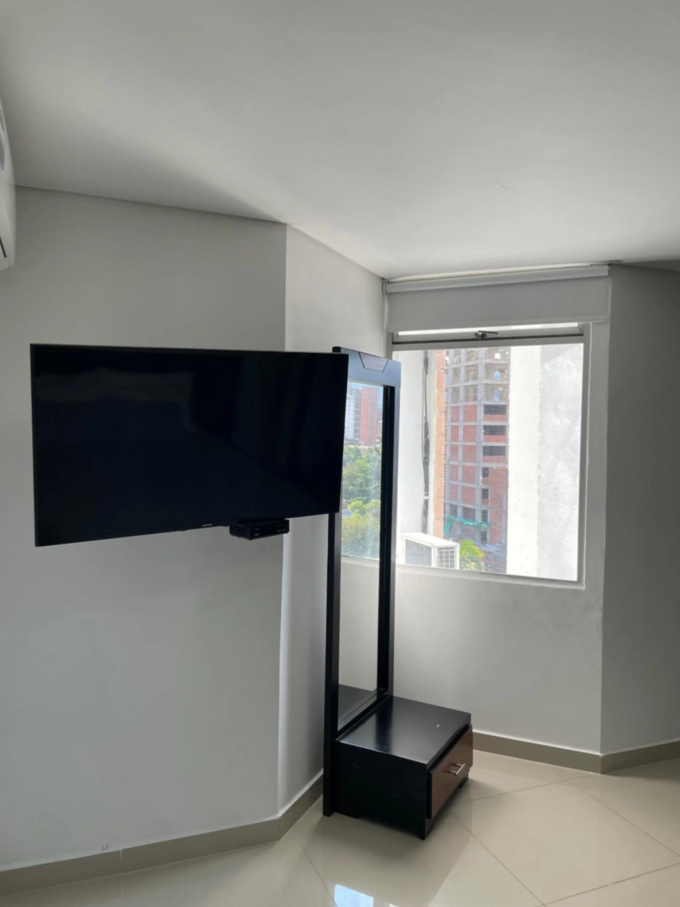 TV and multimedia in Ivanna Jumar ApartaHotel - Laureles Estadio