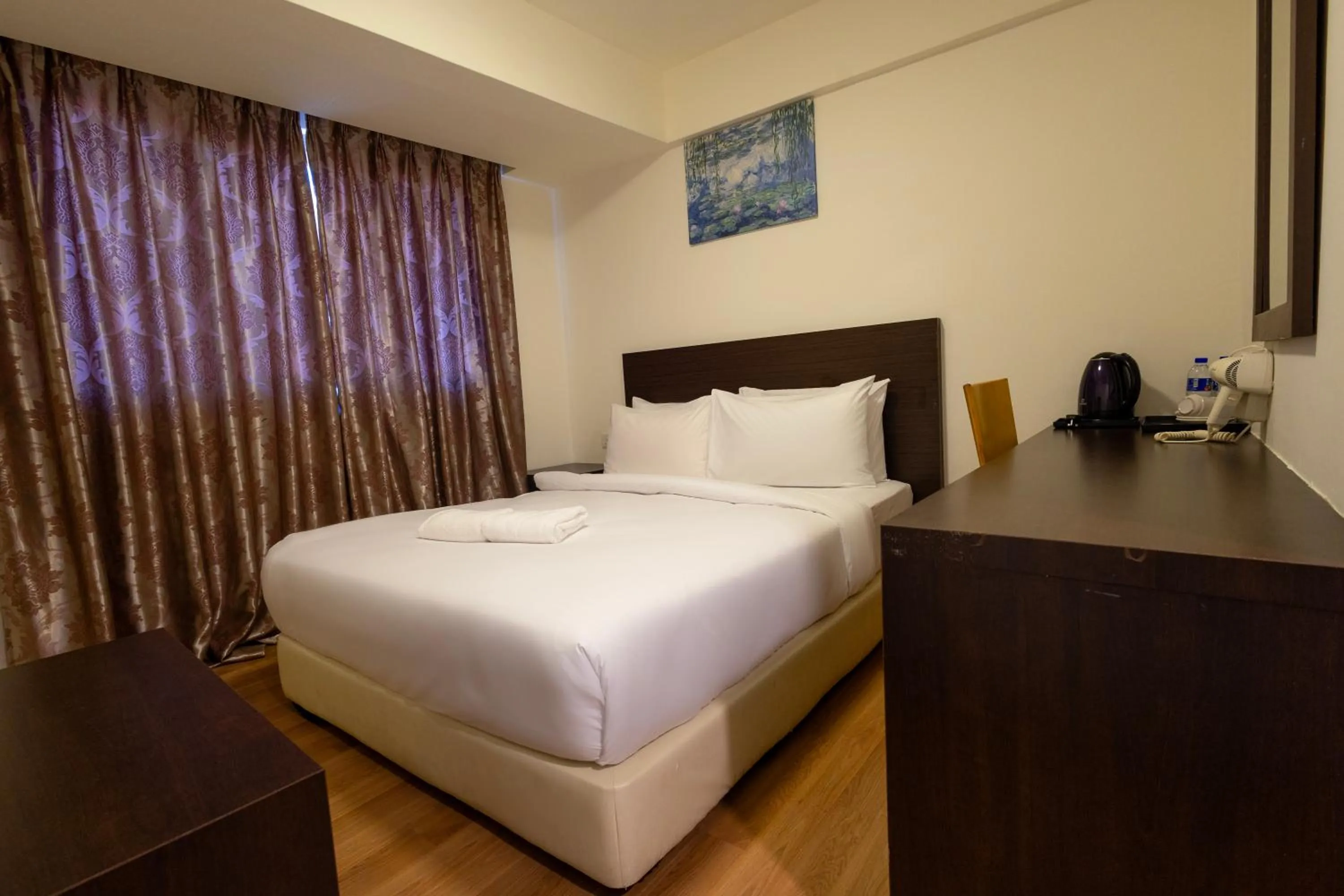 Bed in De Swift Hotel