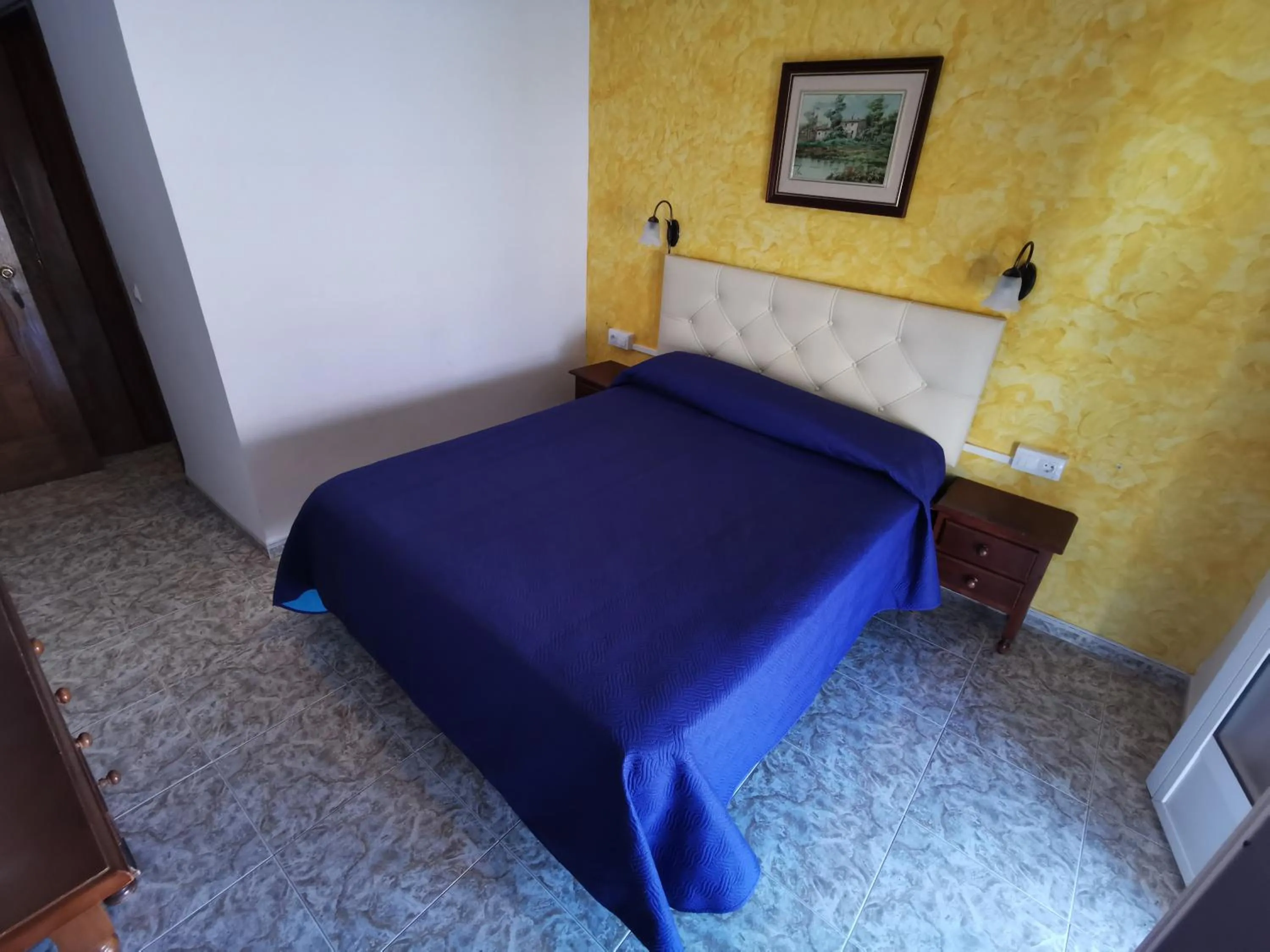 Bed in Hotel Doña Carmen