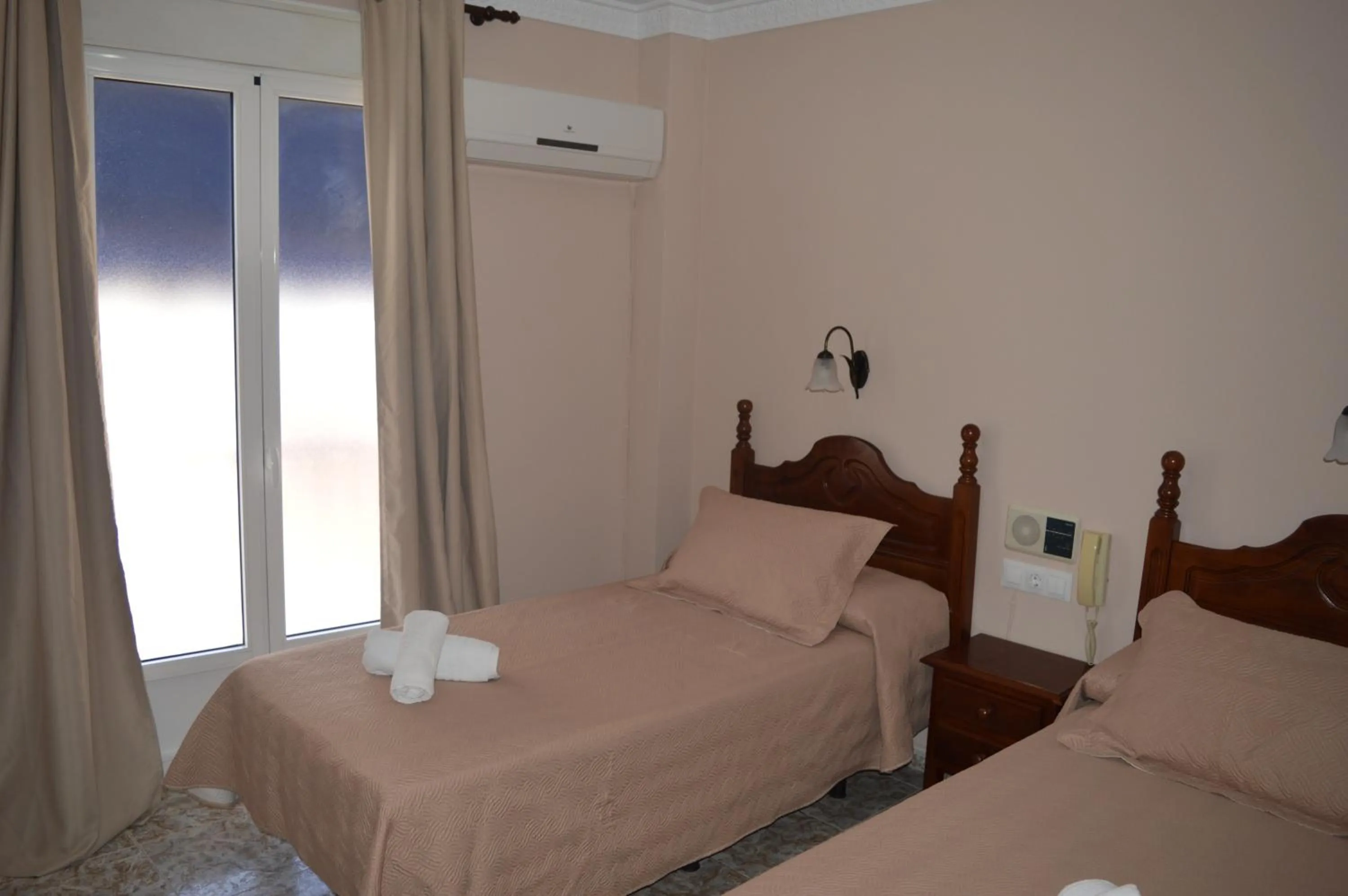 Bed in Hotel Doña Carmen