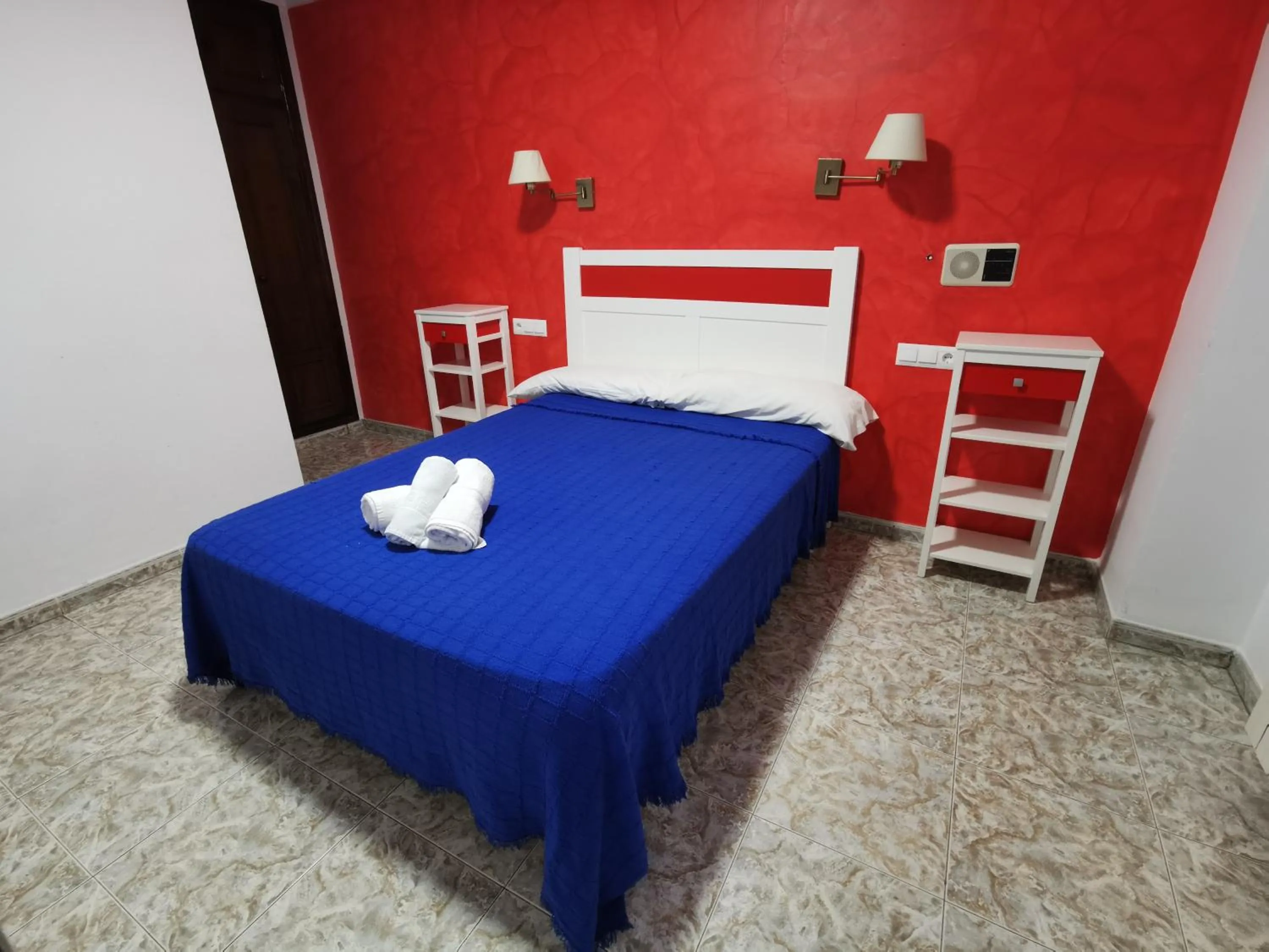 Bed in Hotel Doña Carmen