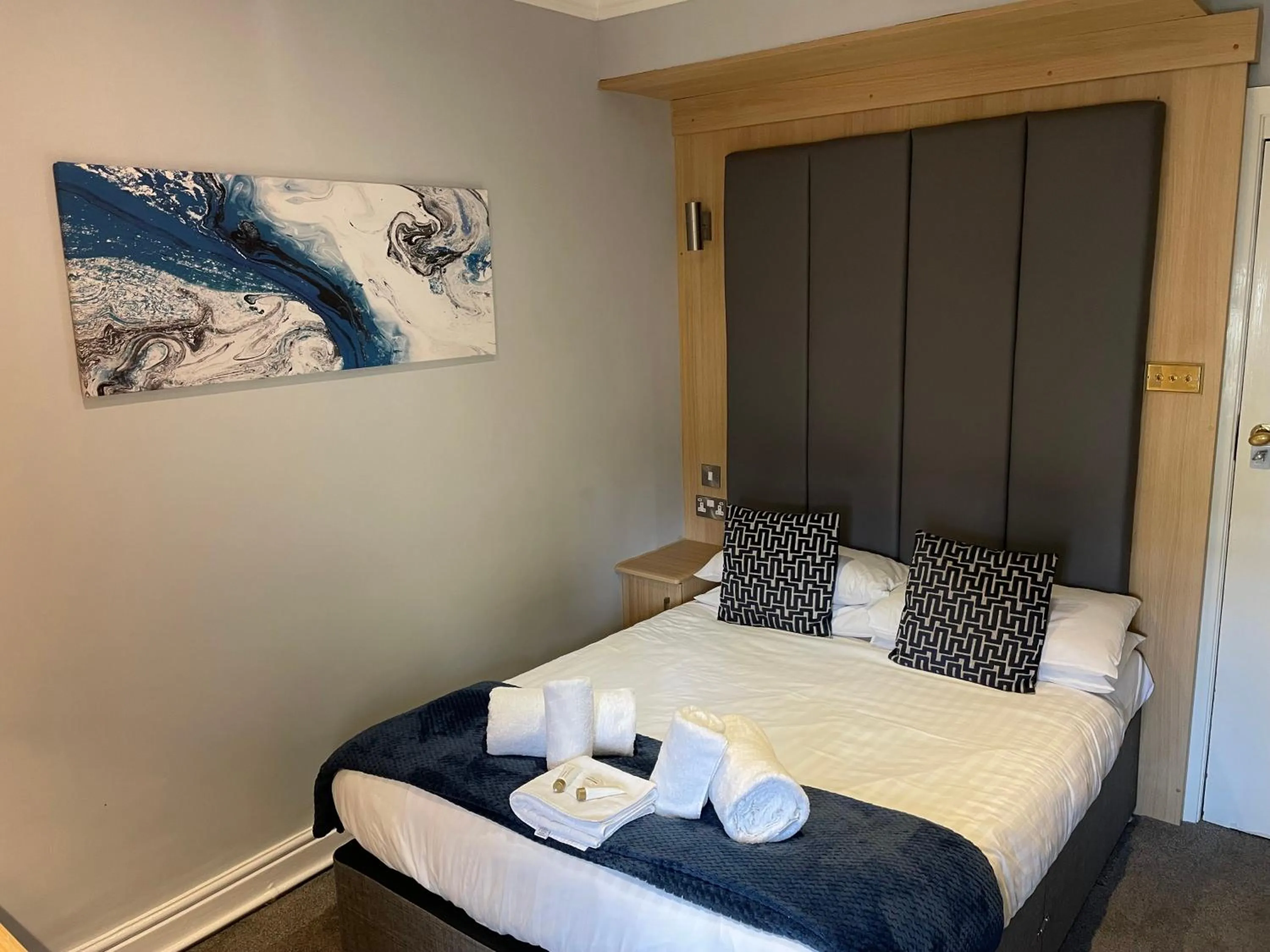 Bed in The Wildings Hotel & Tudno's Restaurant