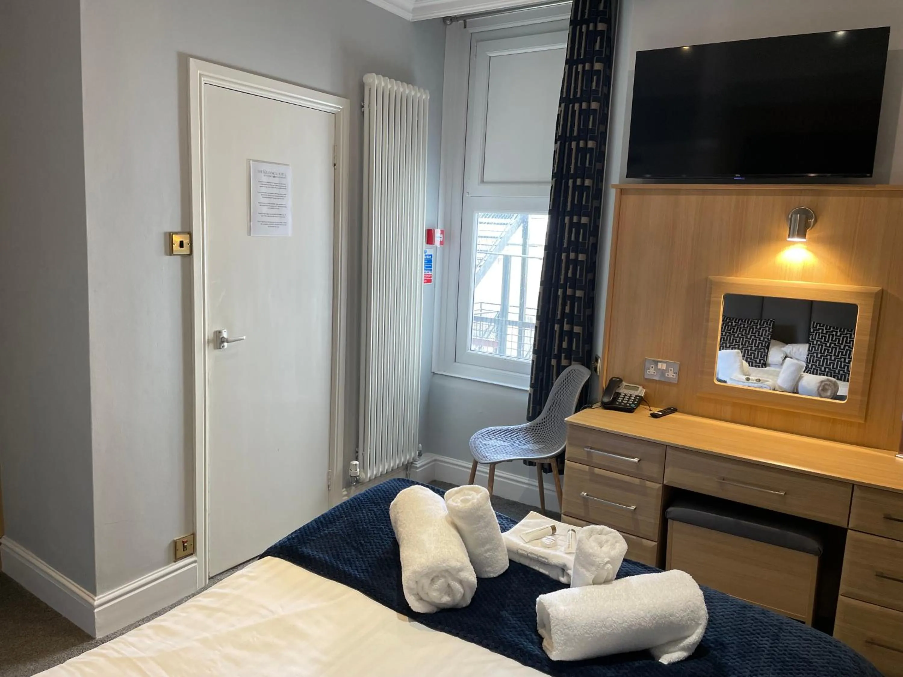 Bed in The Wildings Hotel & Tudno's Restaurant