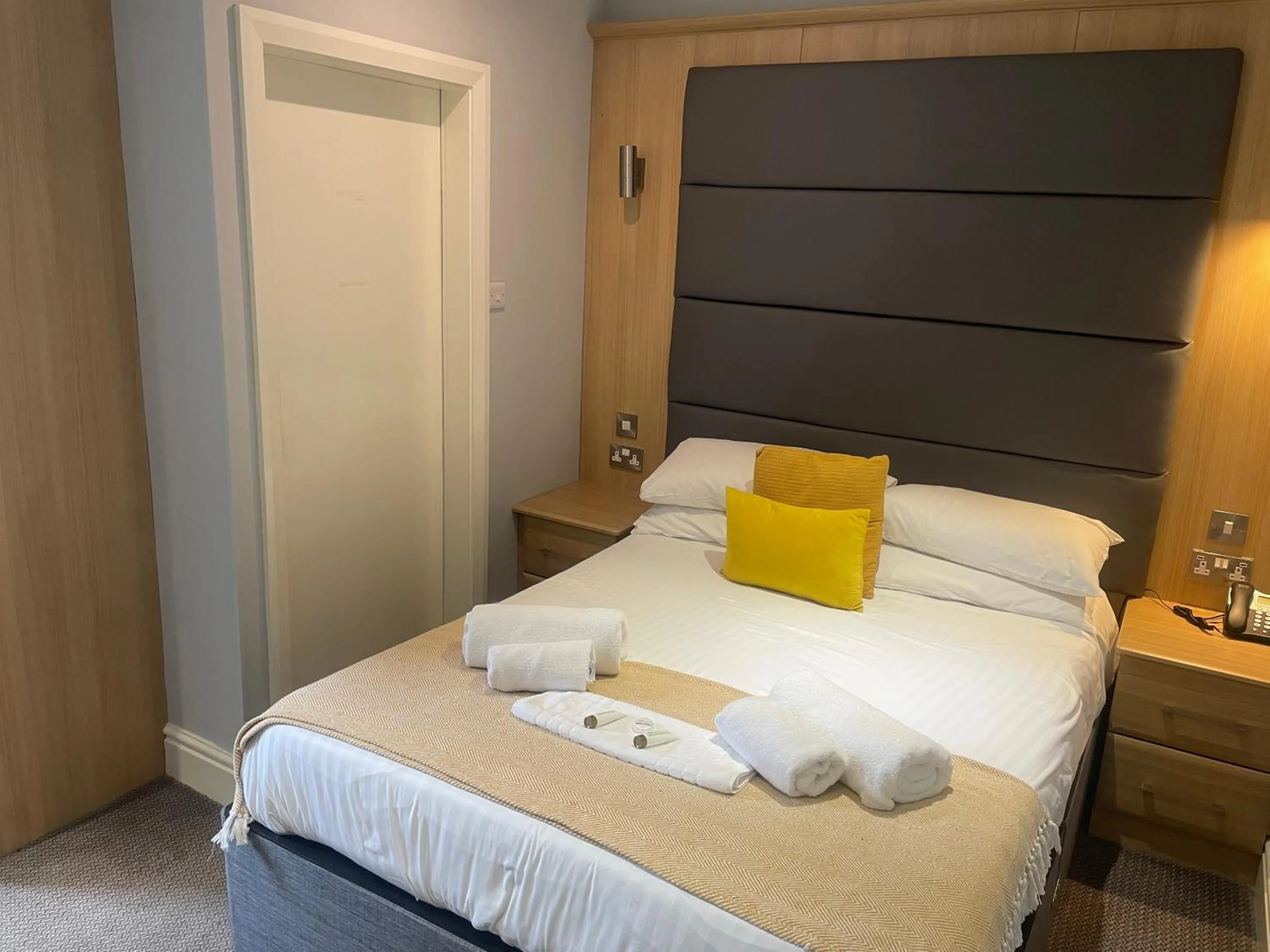 Bed in The Wildings Hotel & Tudno's Restaurant