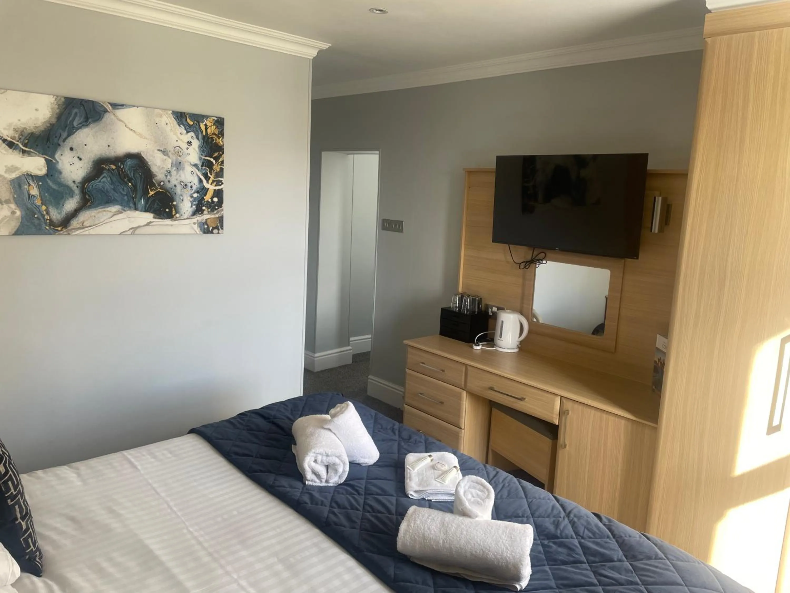 Bed in The Wildings Hotel & Tudno's Restaurant