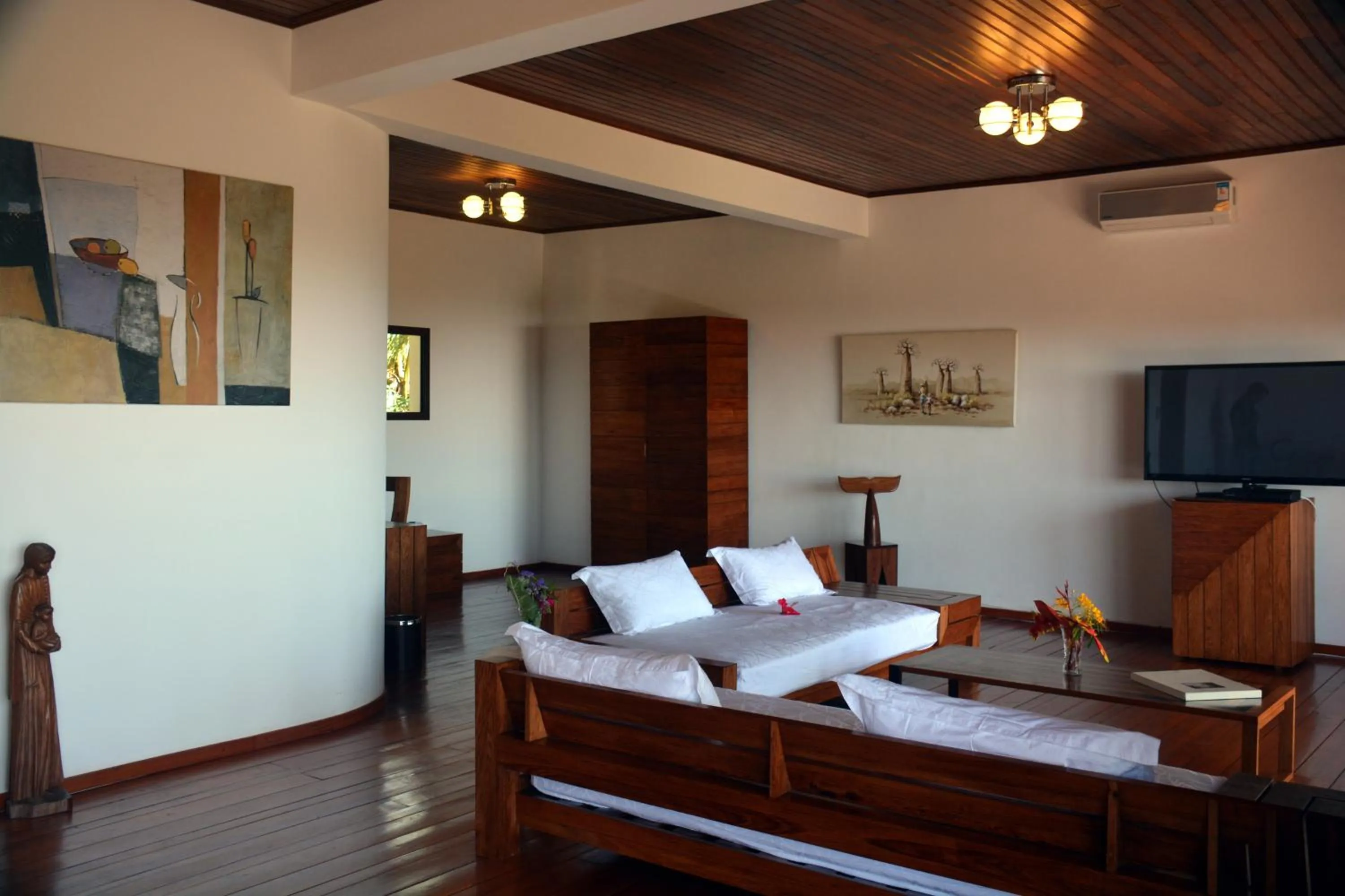 Living room, Bed in Hotel Mahita Tsara