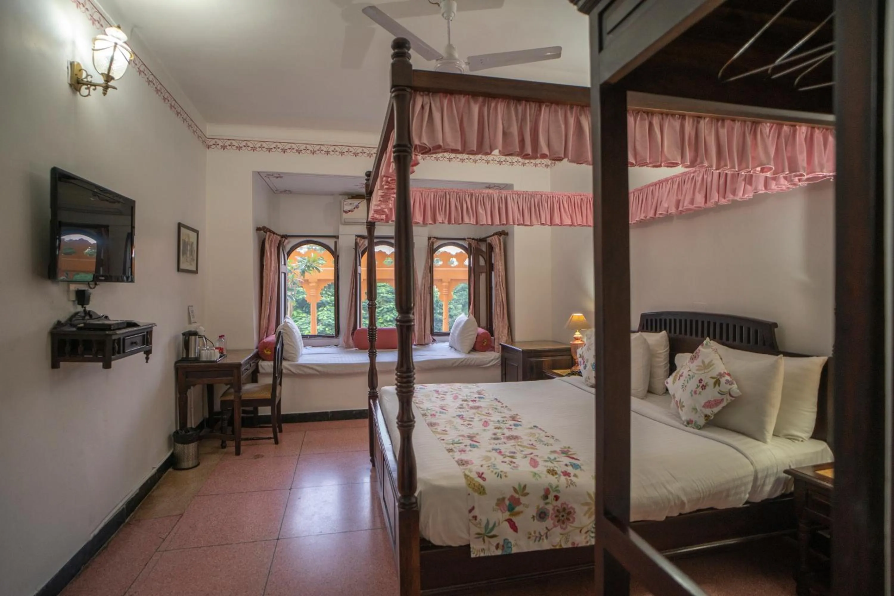 Bed in The Lavitra Lakeview Hotel