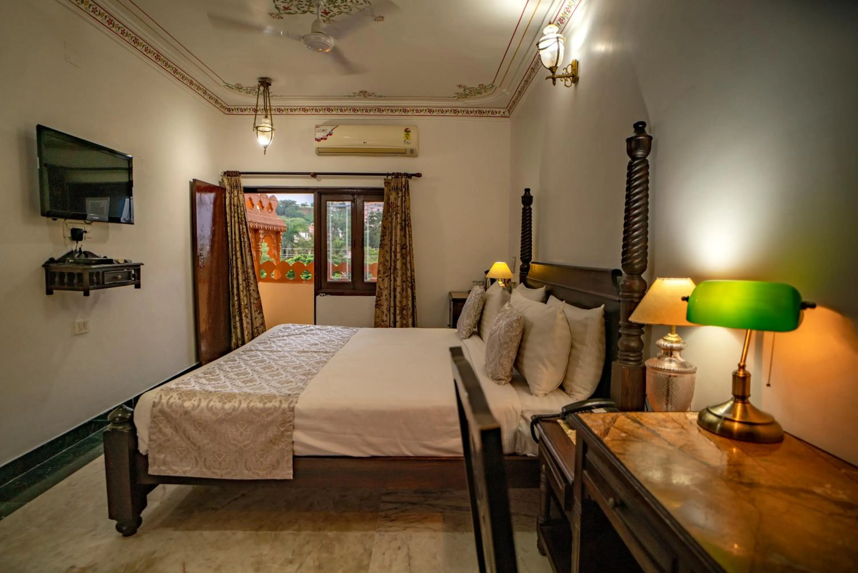 Bed in The Lavitra Lakeview Hotel