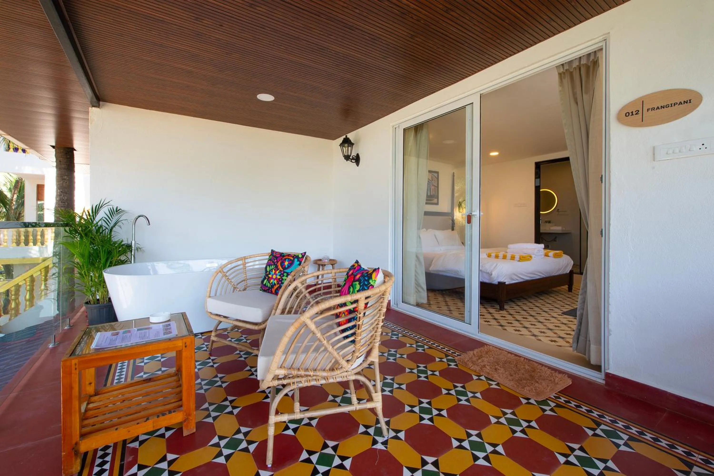 Balcony/Terrace, Bed in The Rose Goa Beach Resort