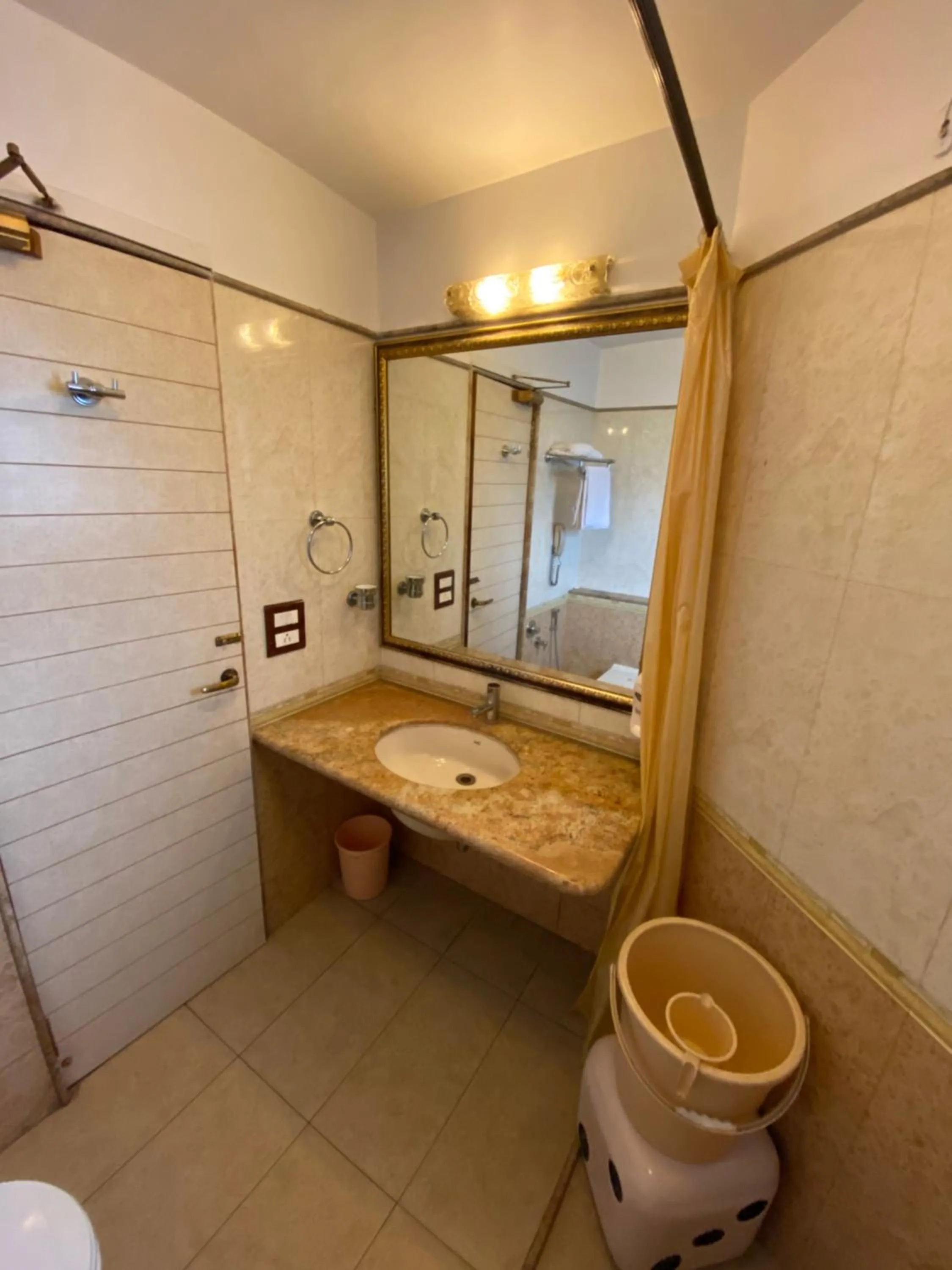 Bathroom in Panchavati Elite Inn