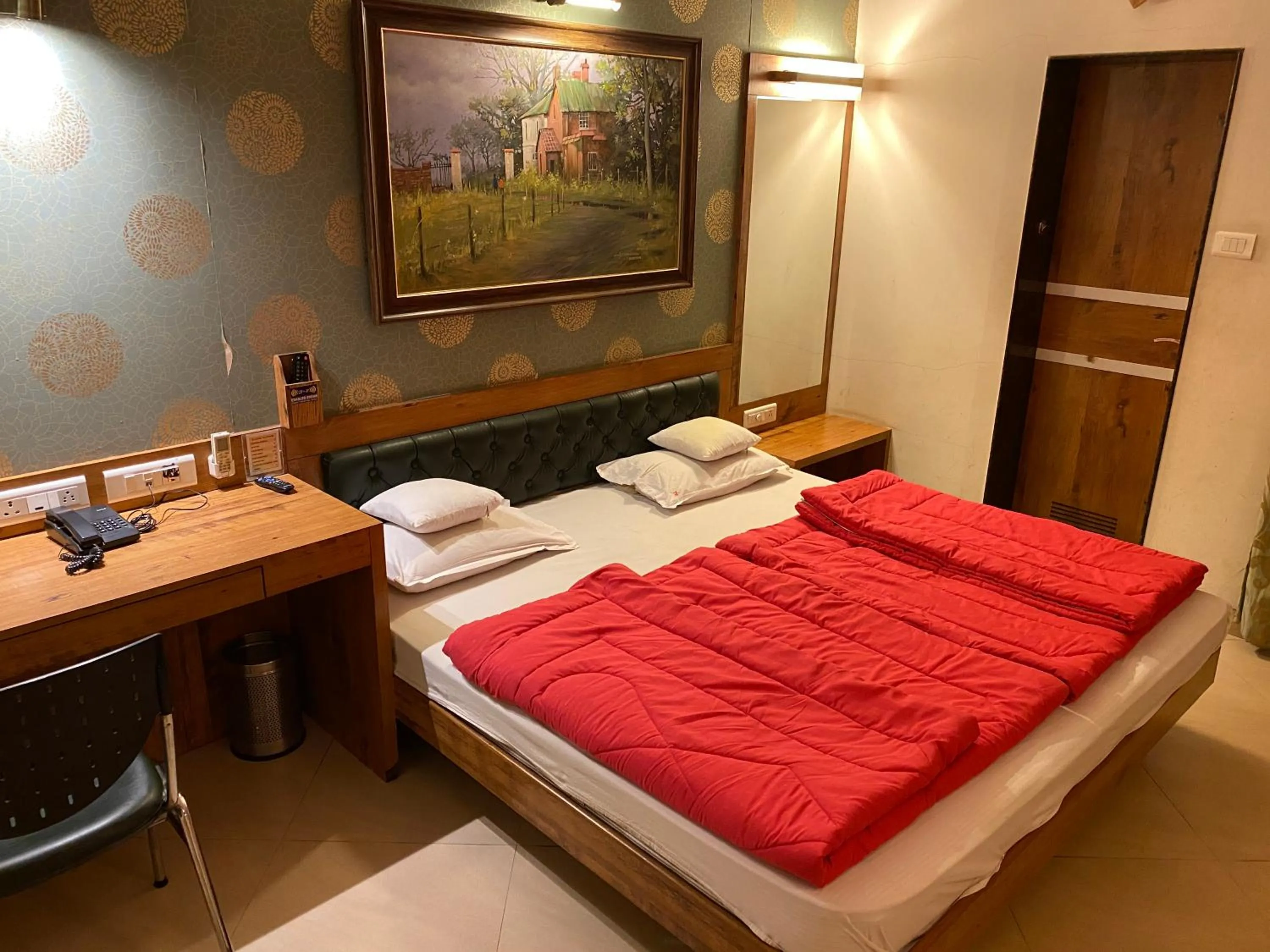 Bed in Panchavati Elite Inn
