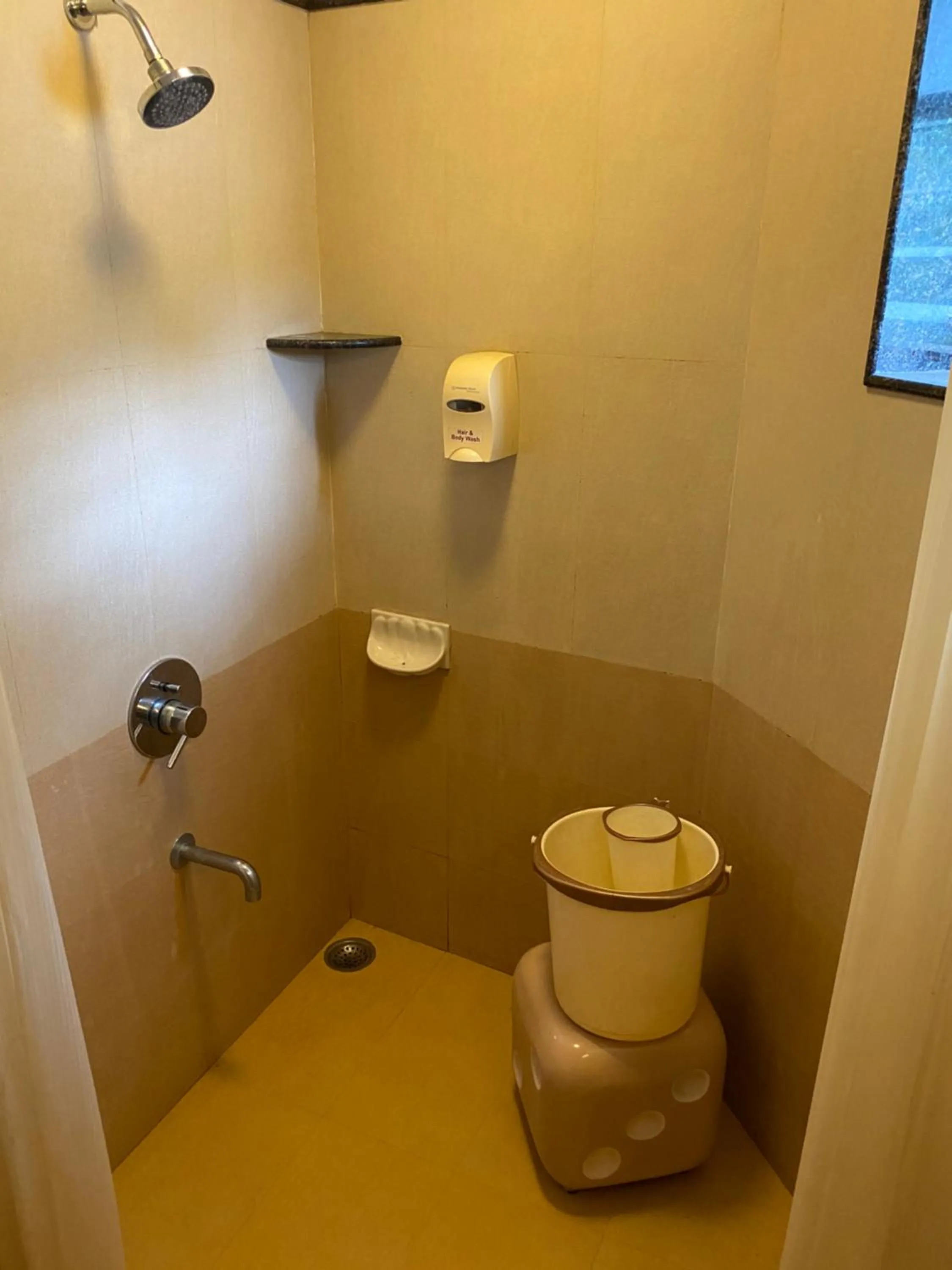 Bathroom in Panchavati Elite Inn