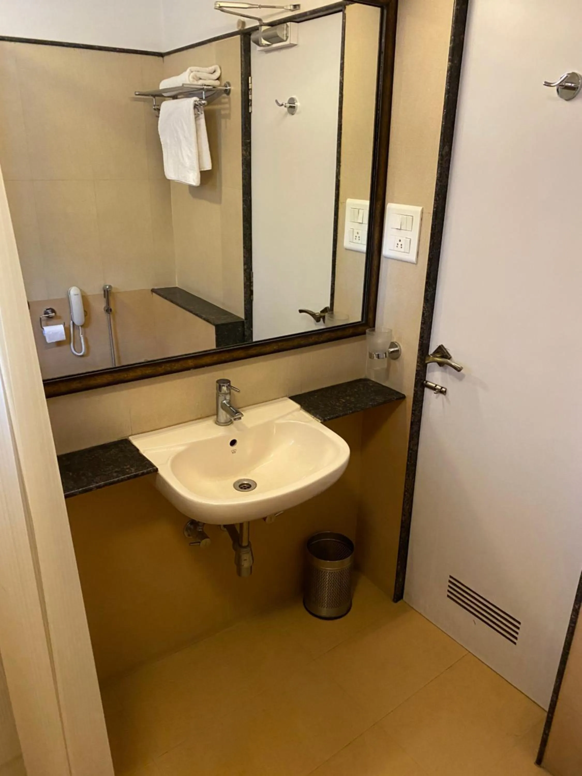 Bathroom in Panchavati Elite Inn