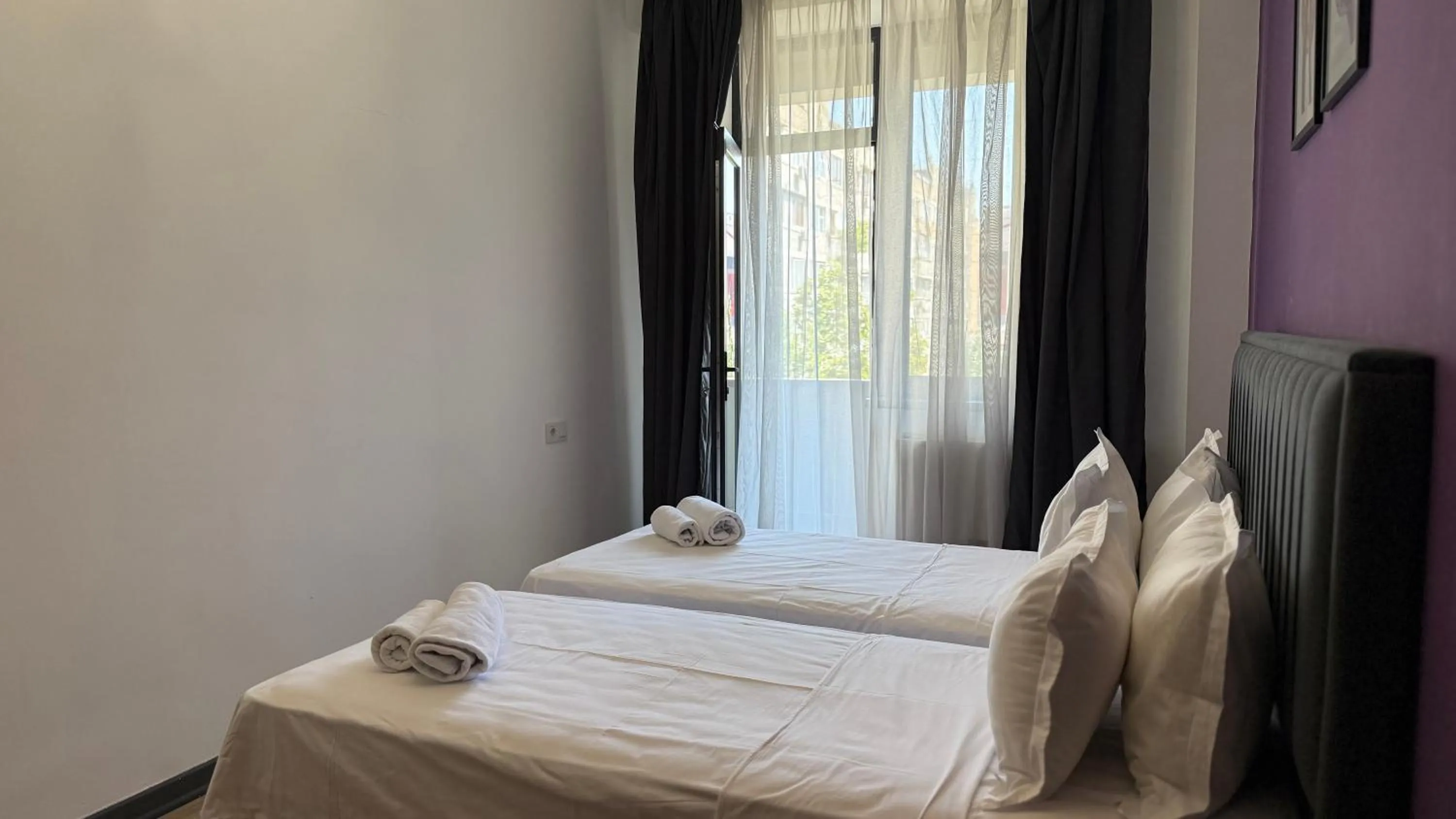 Bed in Sweet Home Deluxe Apart-Hotel