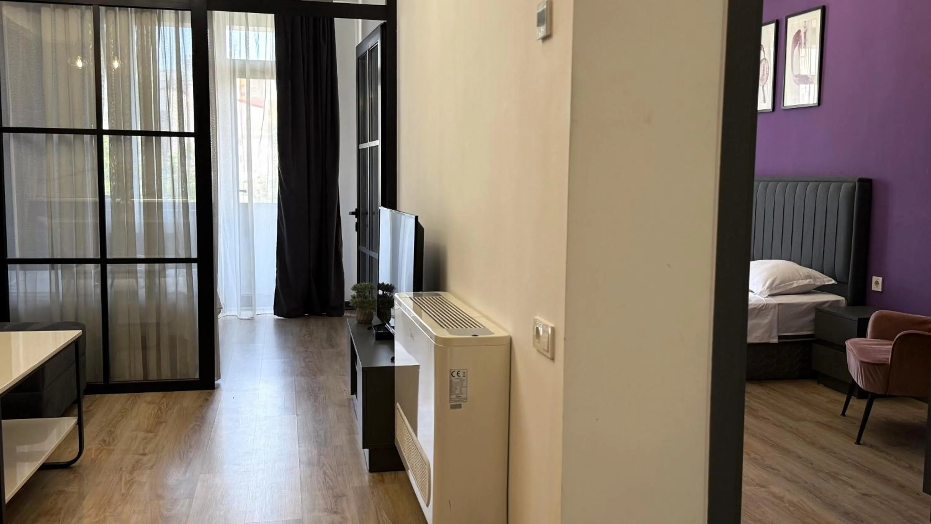 Bed in Sweet Home Deluxe Apart-Hotel