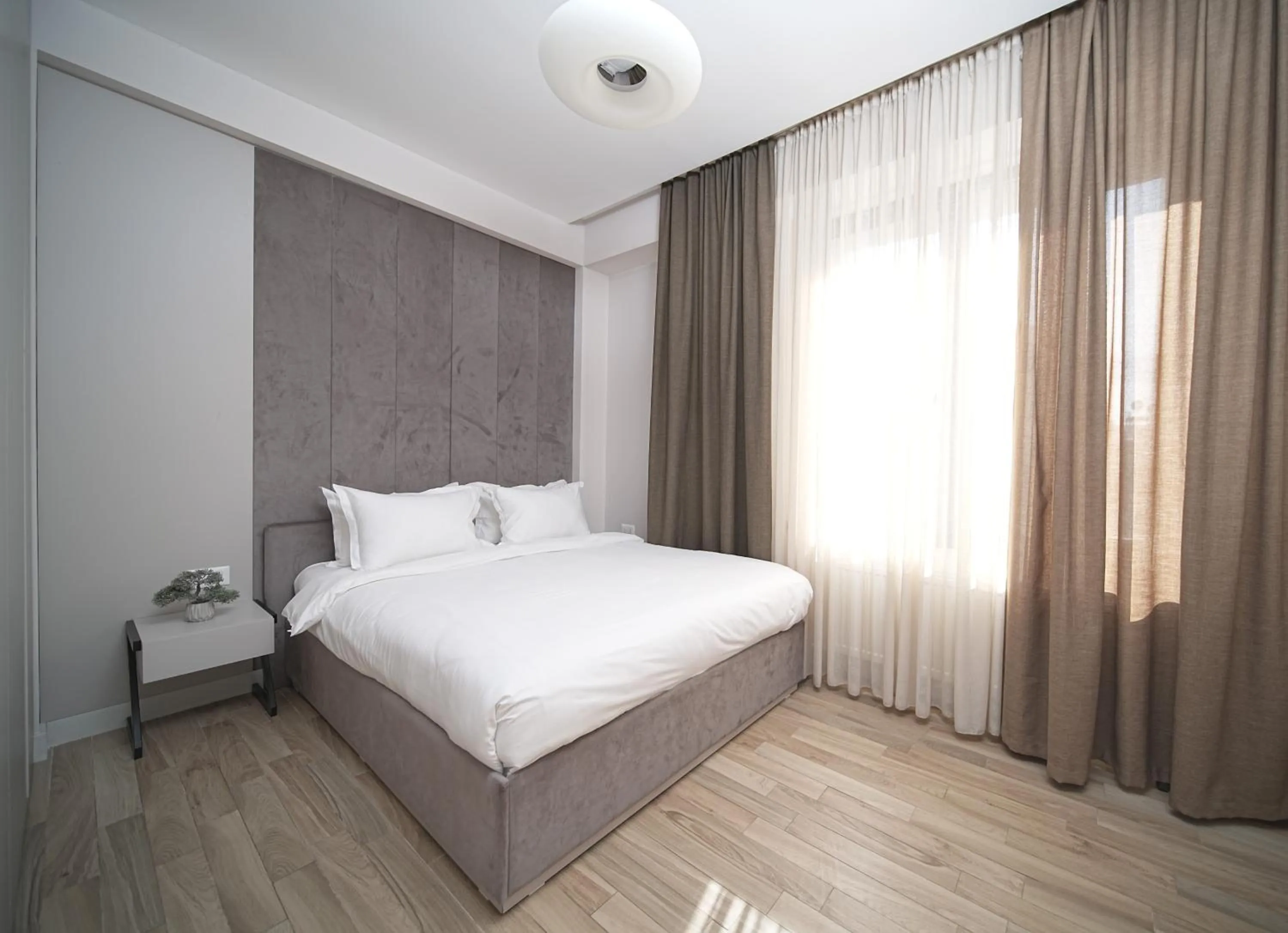 Bed in Sweet Home Deluxe Apart-Hotel