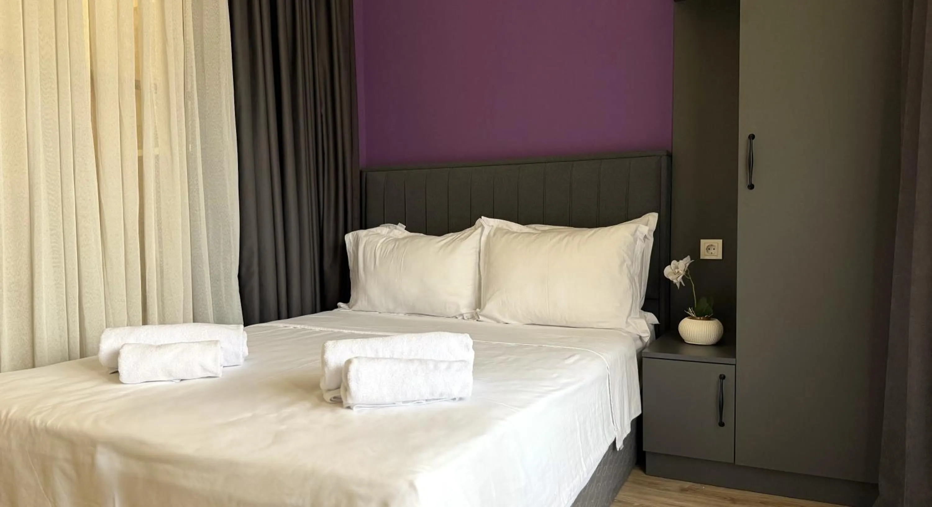 Bed in Sweet Home Deluxe Apart-Hotel