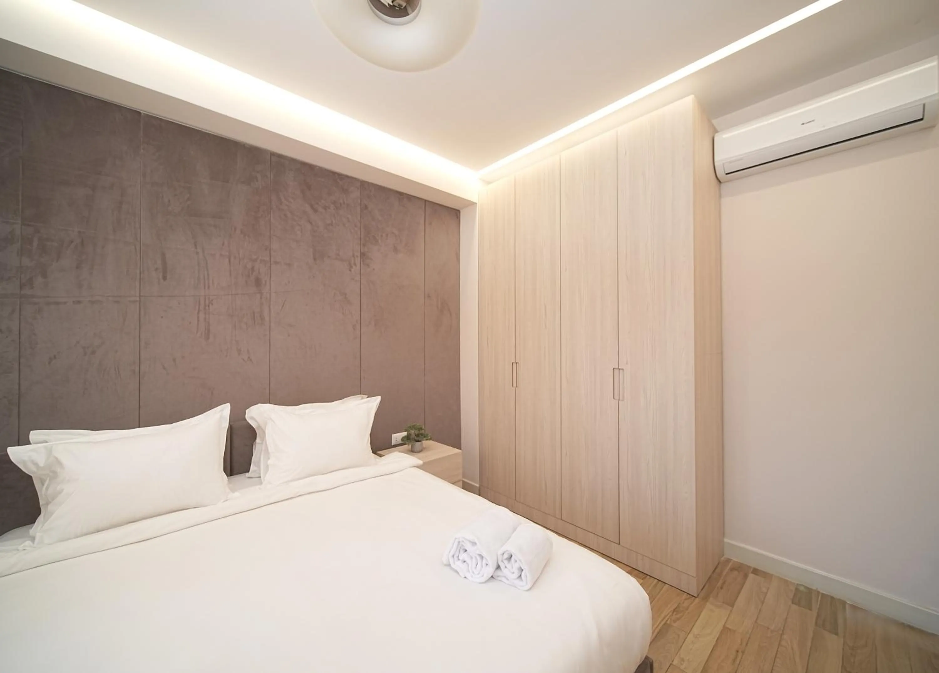 Bed in Sweet Home Deluxe Apart-Hotel