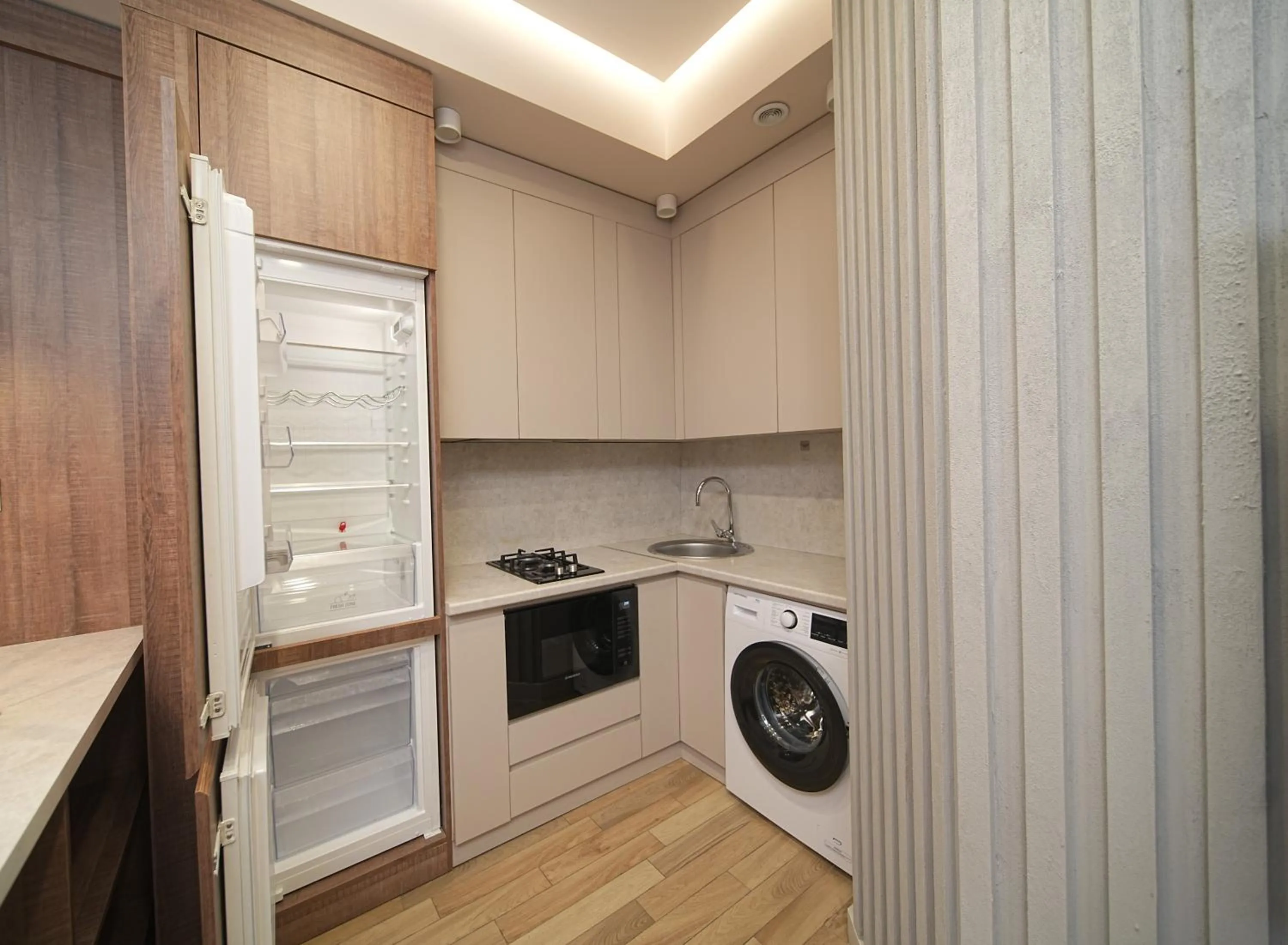 Kitchen or kitchenette in Sweet Home Deluxe Apart-Hotel