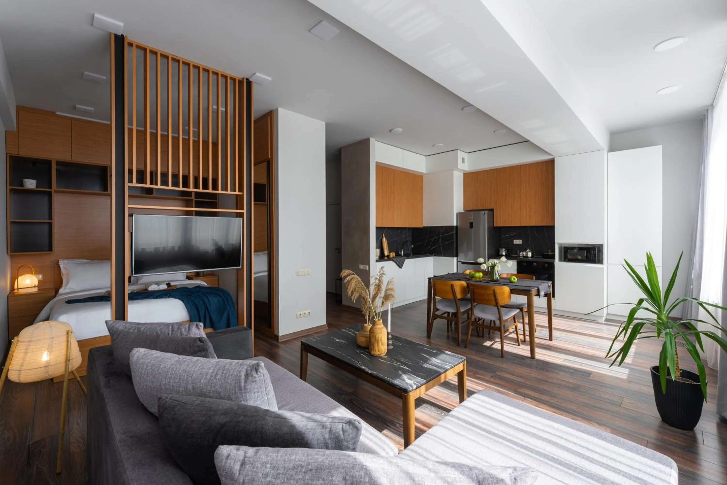 Bed in Sweet Home Deluxe Apart-Hotel