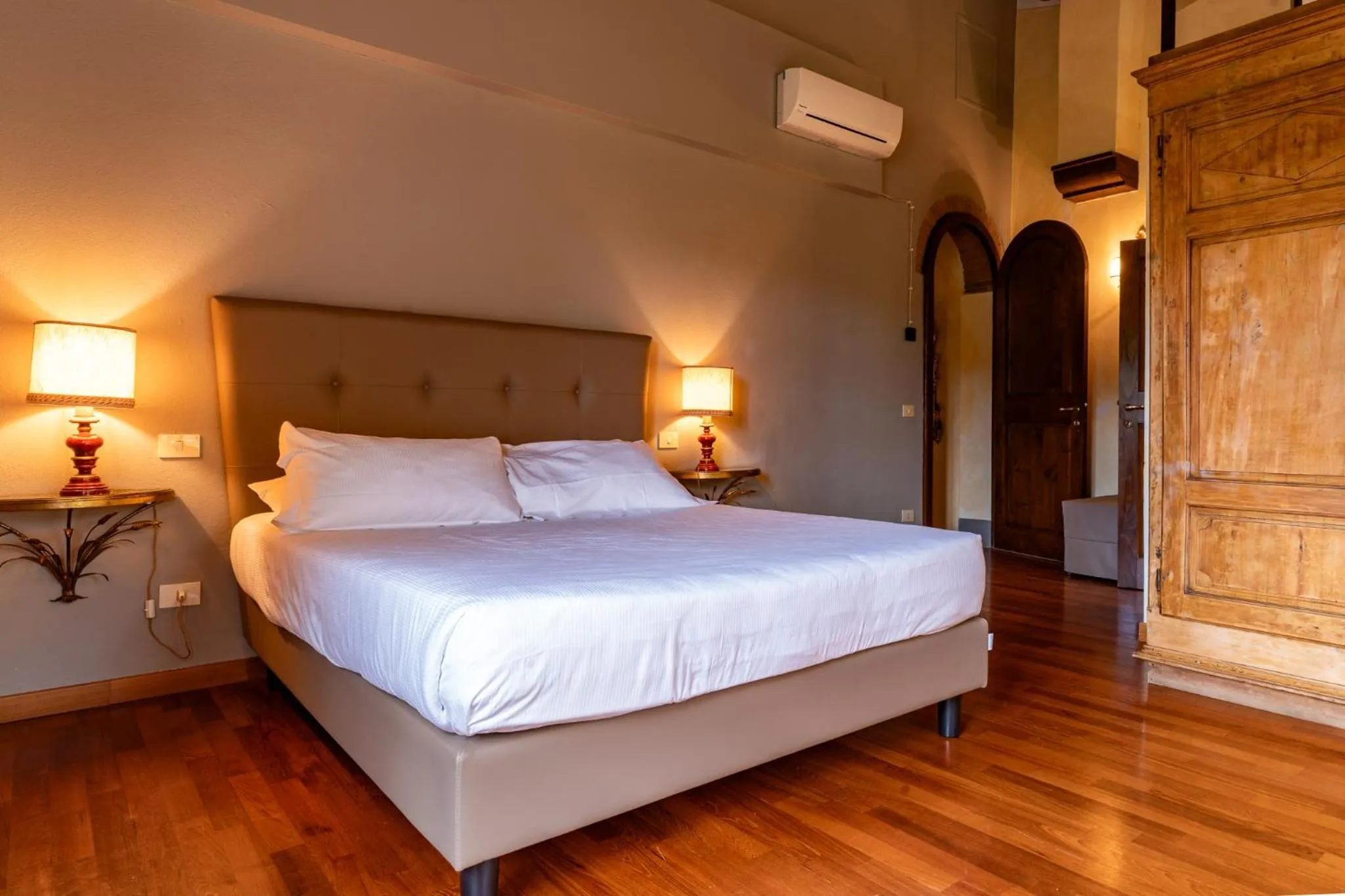 Bed in Le Filigare Wine & Country Relais